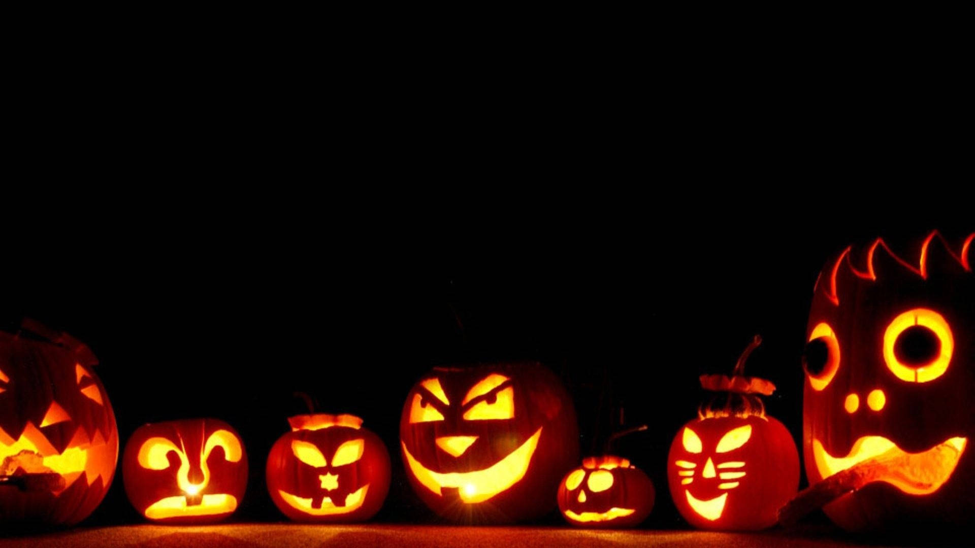 Halloween Laptop, jack-o'-lanterns, menacing carved faces, Full HD Desktop Wallpaper