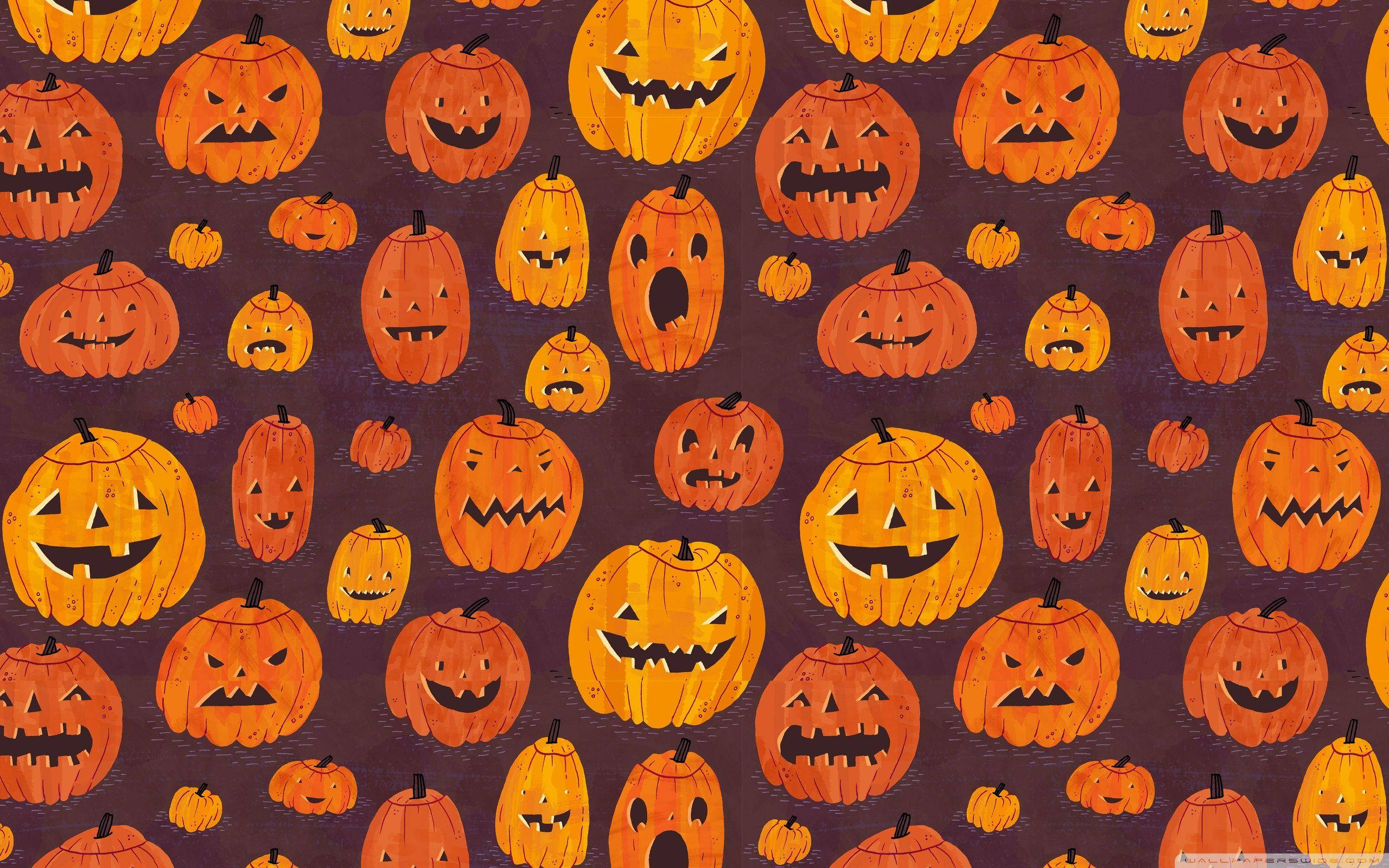 Halloween, orange jack-o'-lanterns, dark purple background, 2K Desktop Wallpaper