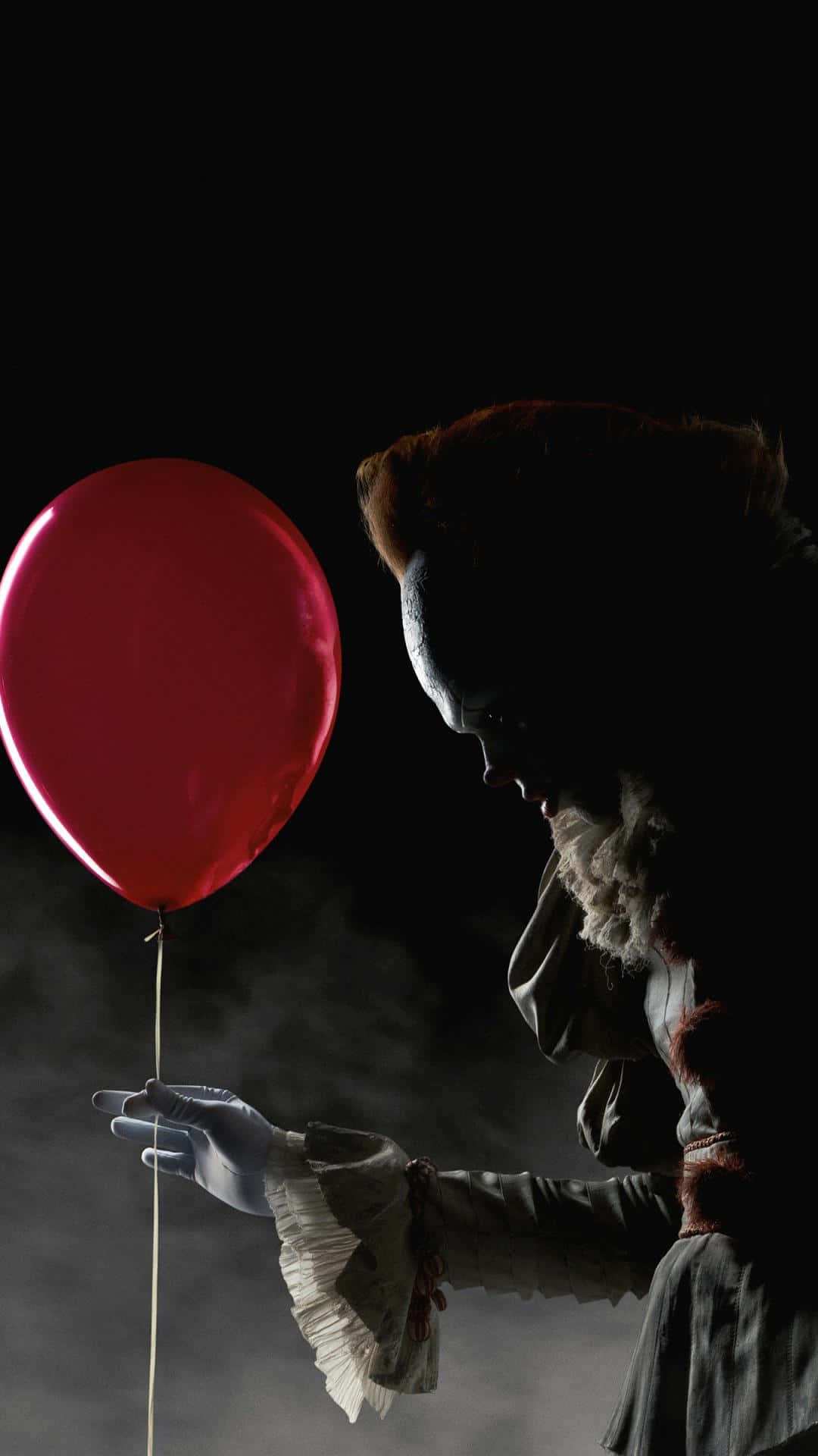 creepy clown, glowing red balloon, dark smoky backdrop, Full HD Phone Wallpaper