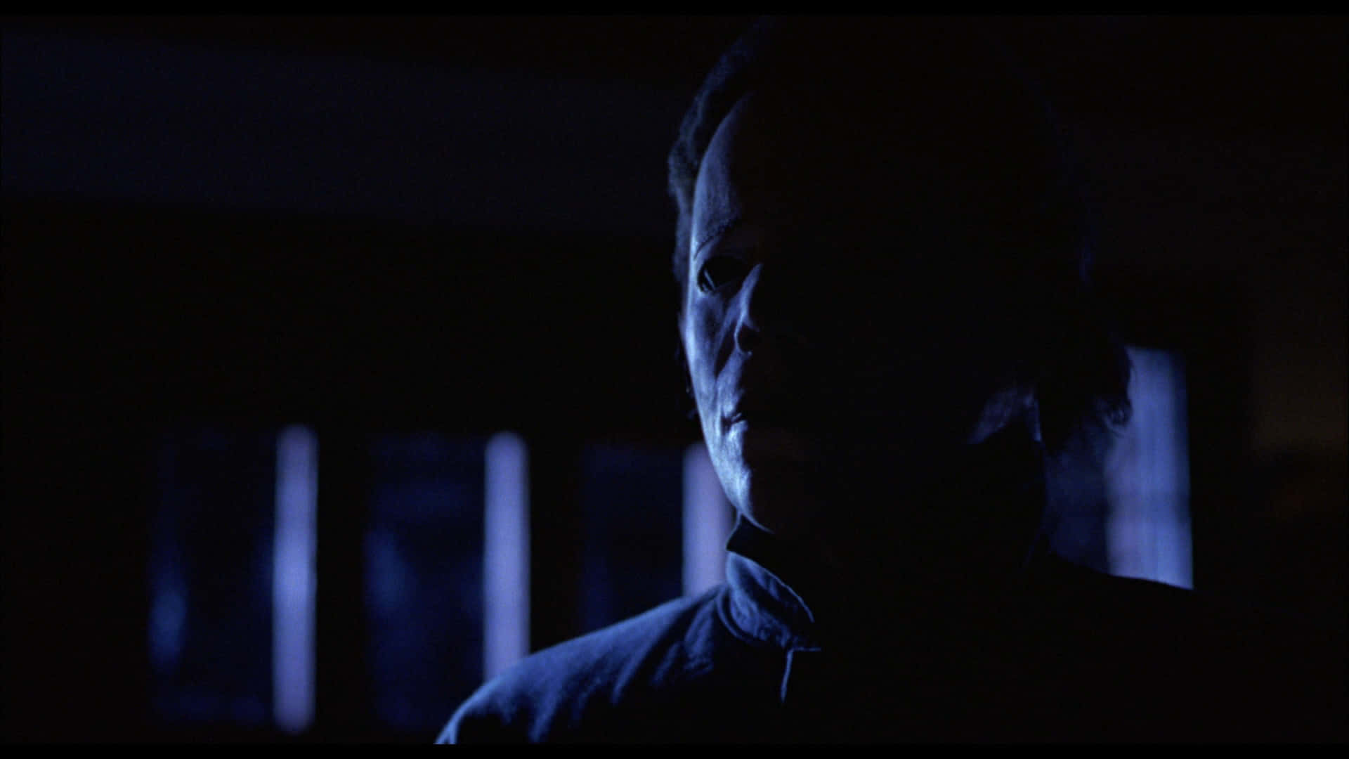 Halloween Michael Myers, masked figure, dimly lit room, Full HD Desktop Wallpaper