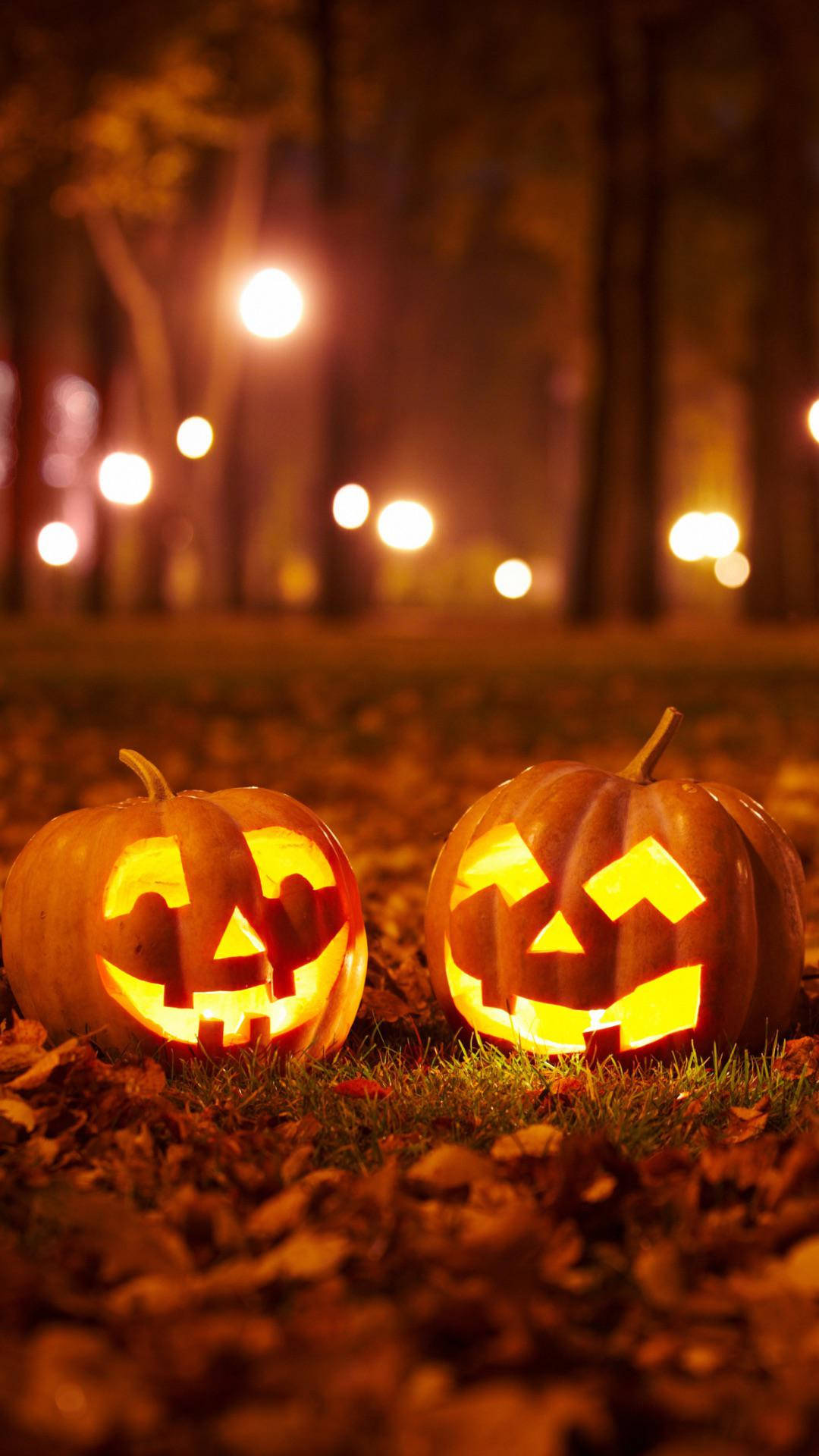 jack-o'-lanterns, autumn forest, fallen autumn leaves, Full HD Phone Wallpaper