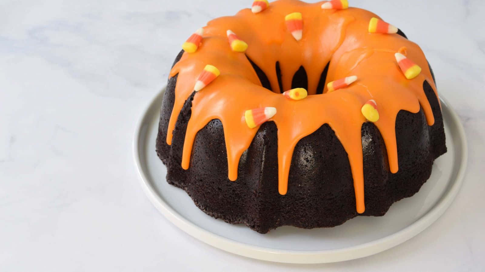 Halloween cake, chocolate bundt cake, vibrant orange icing, HD Desktop Wallpaper