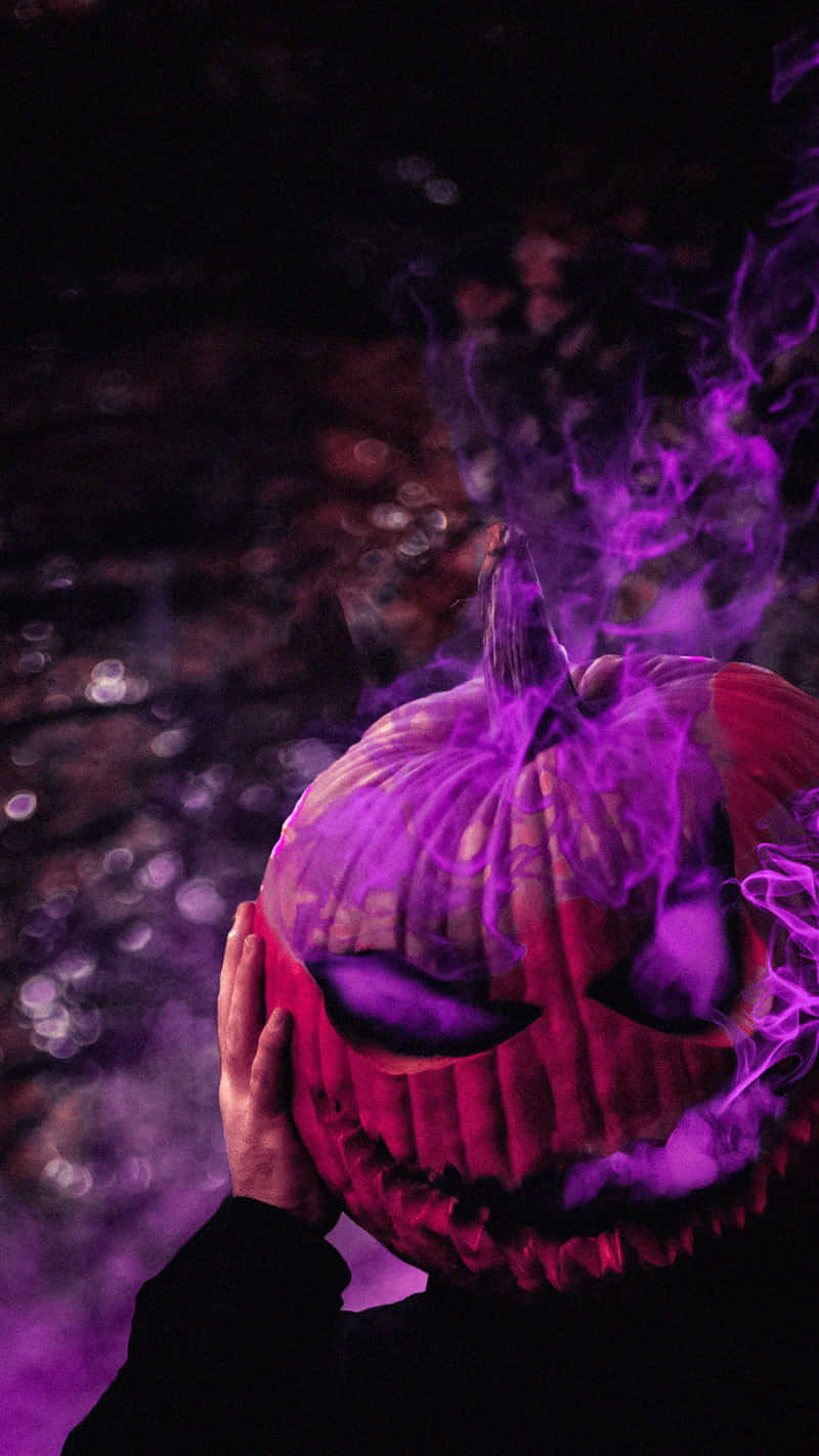 glowing jack-o'-lantern, swirling purple smoke, dark bokeh background, HD Phone Wallpaper