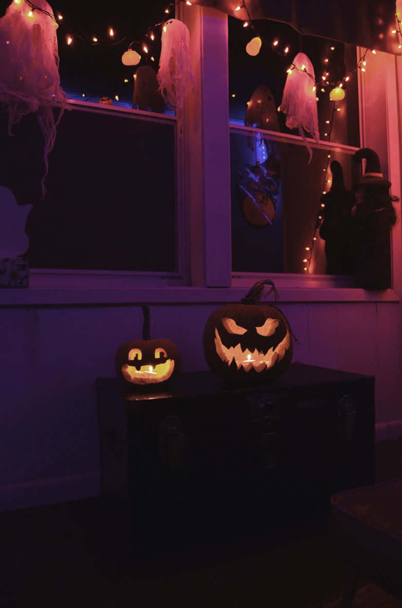 Halloweentown, jack-o'-lanterns, purple string lights, SD Phone Wallpaper