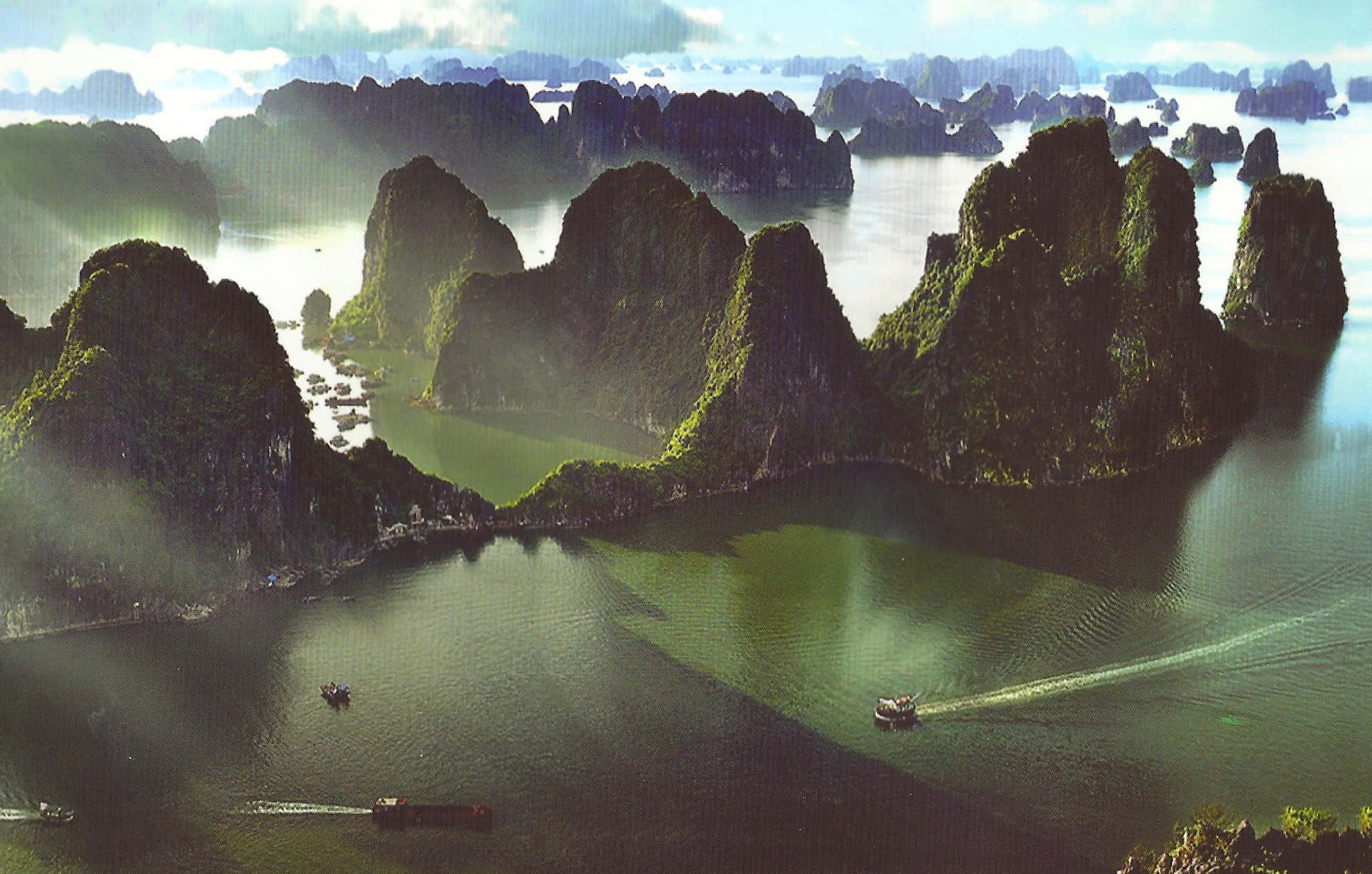 Halong Bay, towering green karst islands, calm turquoise waters, Full HD Desktop Wallpaper