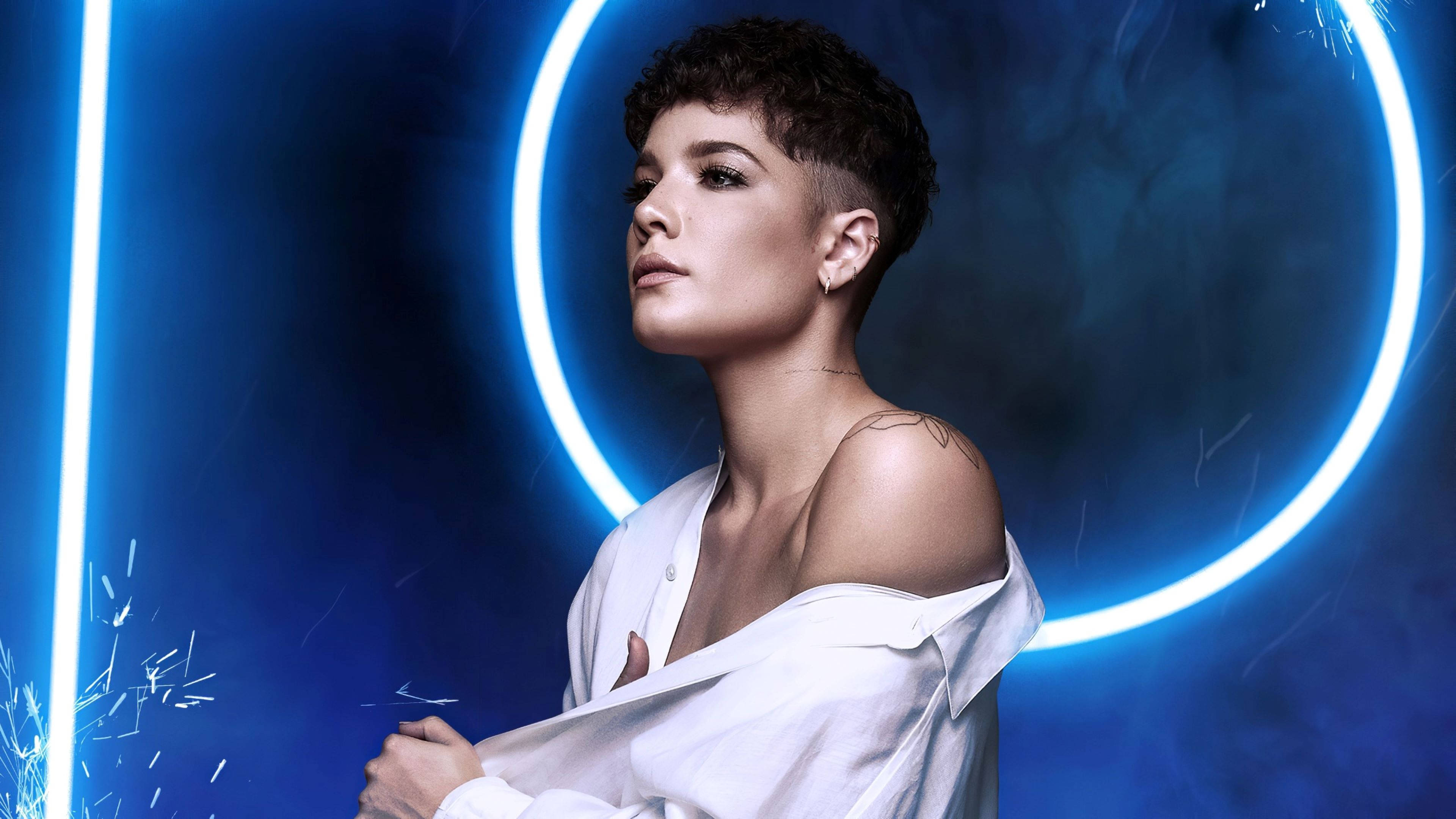 Halsey, curly boy-cut, blue neon-lit studio, 4K Desktop Wallpaper