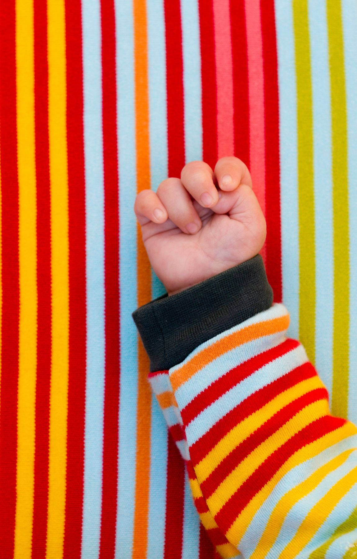 baby hand, colorful striped sweater, clenched fist, HD Phone Wallpaper