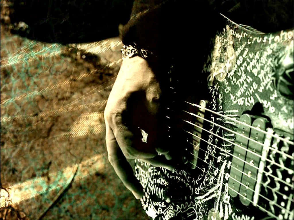 heavy metal guitar, graffiti-covered electric guitar, moody green and brown lighting, SD Desktop Wallpaper