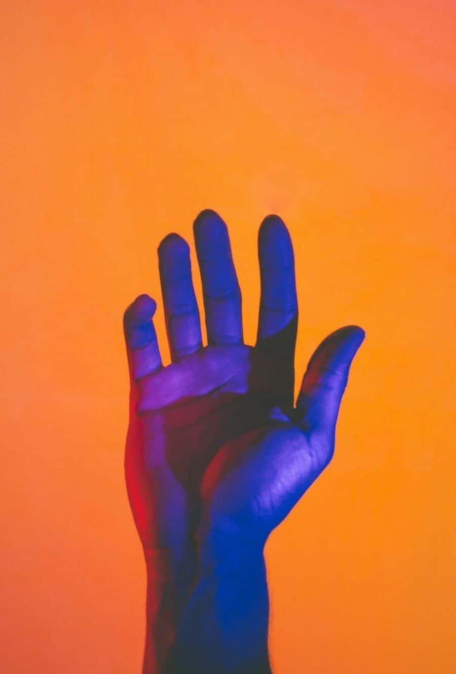 Pastel Orange, open hand, glowing orange backdrop, HD Phone Wallpaper