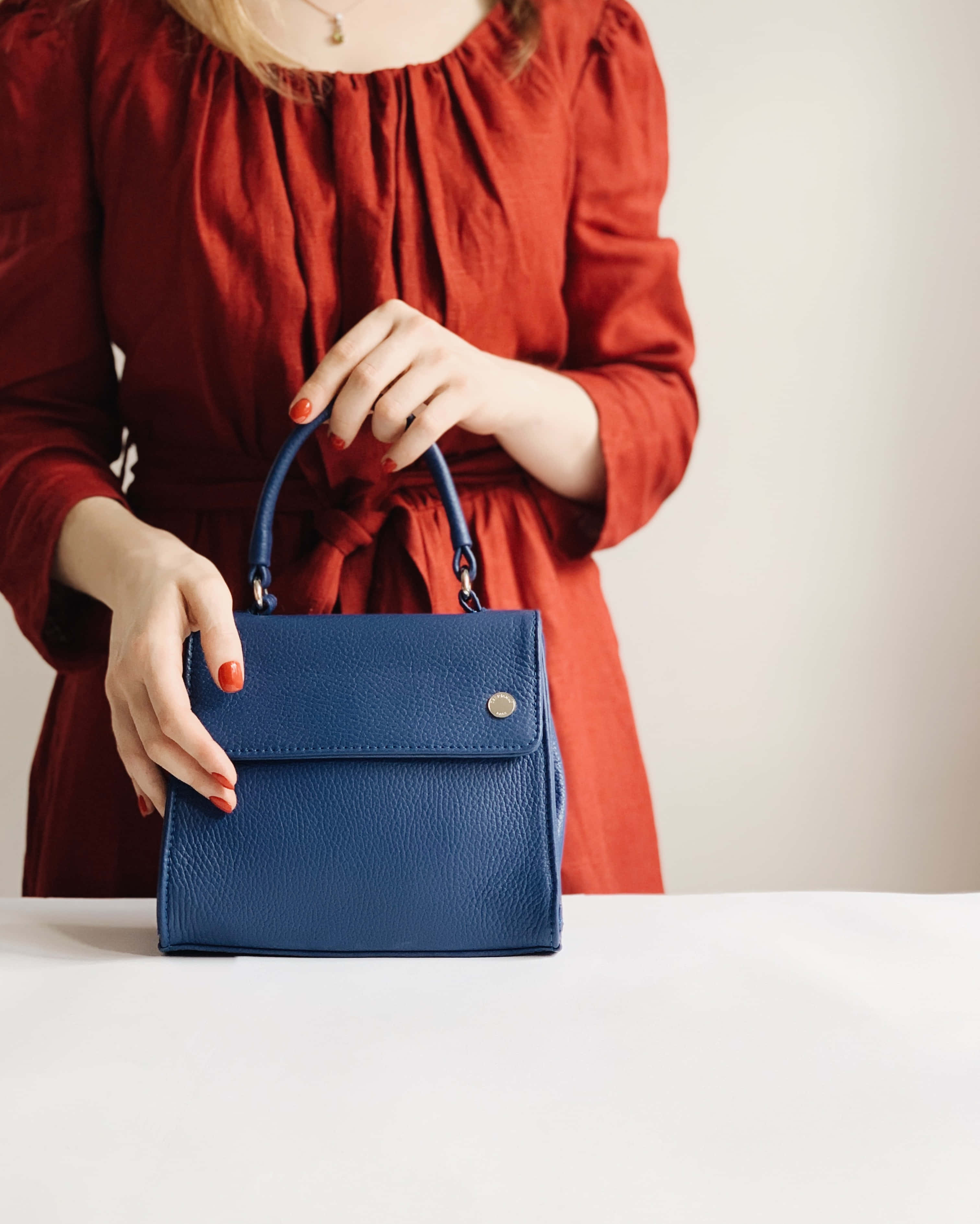 blue korean leather handbag, rust red dress, textured blue leather handbag, 2K Phone Wallpaper