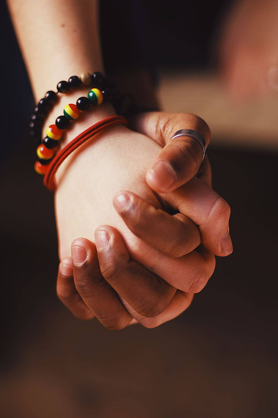 beaded bracelet, ring, dark blurred background, HD Phone Wallpaper