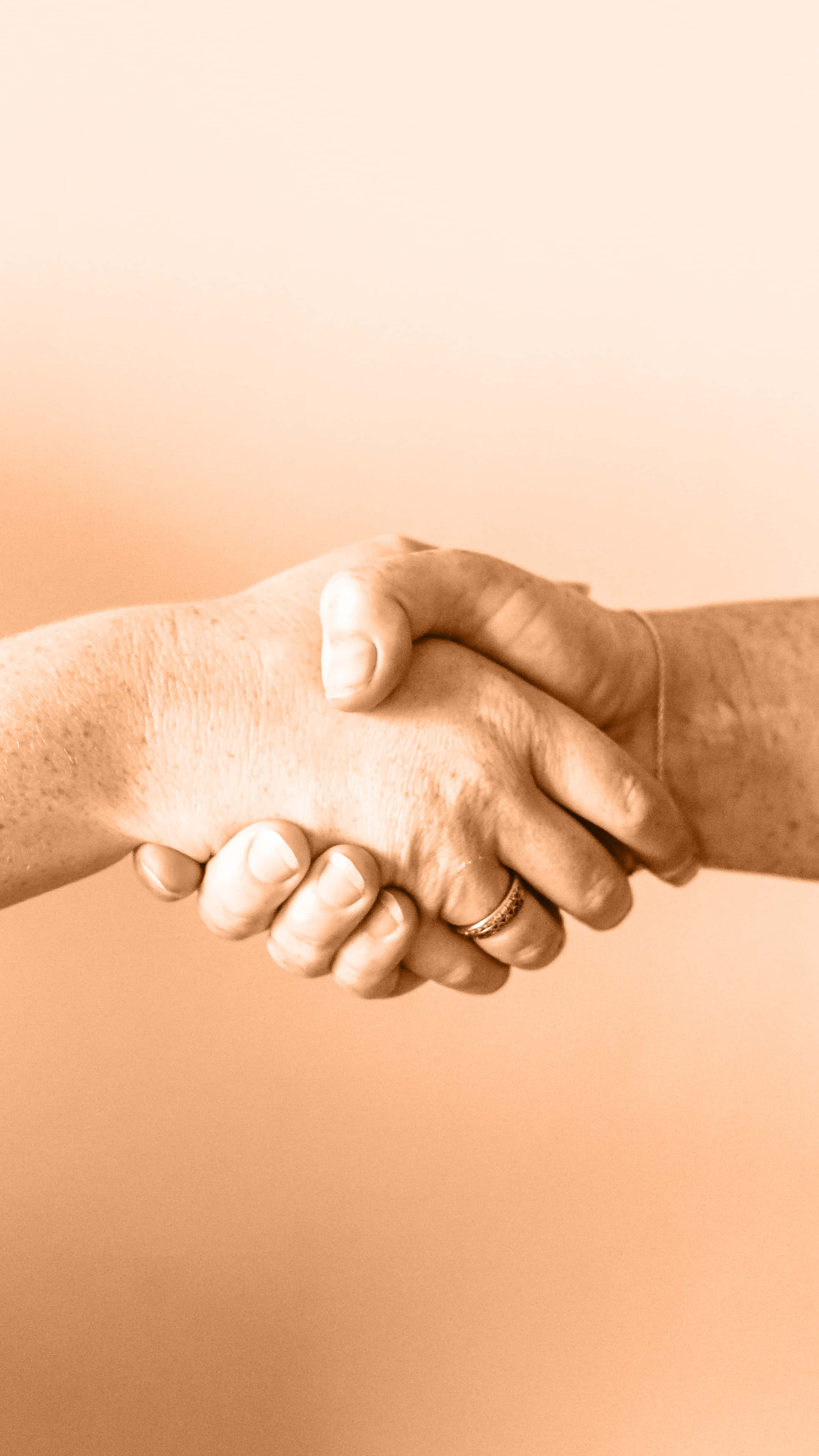 Firm Handshake, peach gradient background, 4K Phone Wallpaper