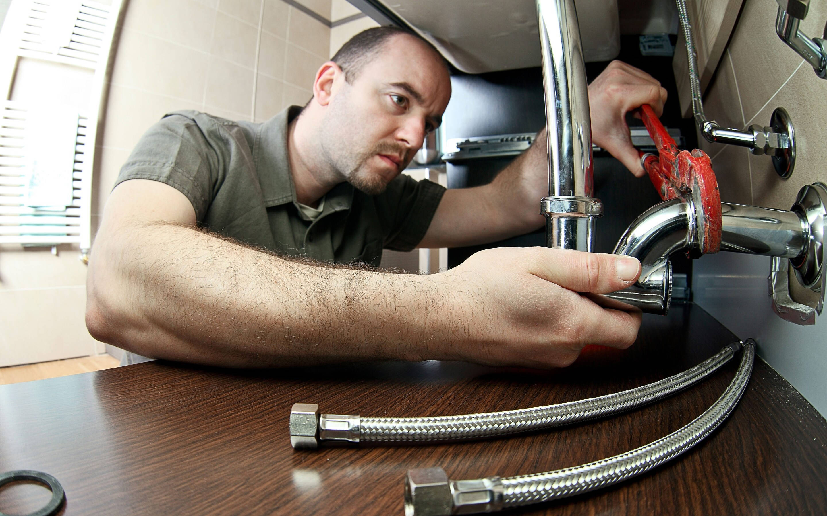 red wrench, shiny chrome faucet, wooden countertop, 2K Desktop Wallpaper