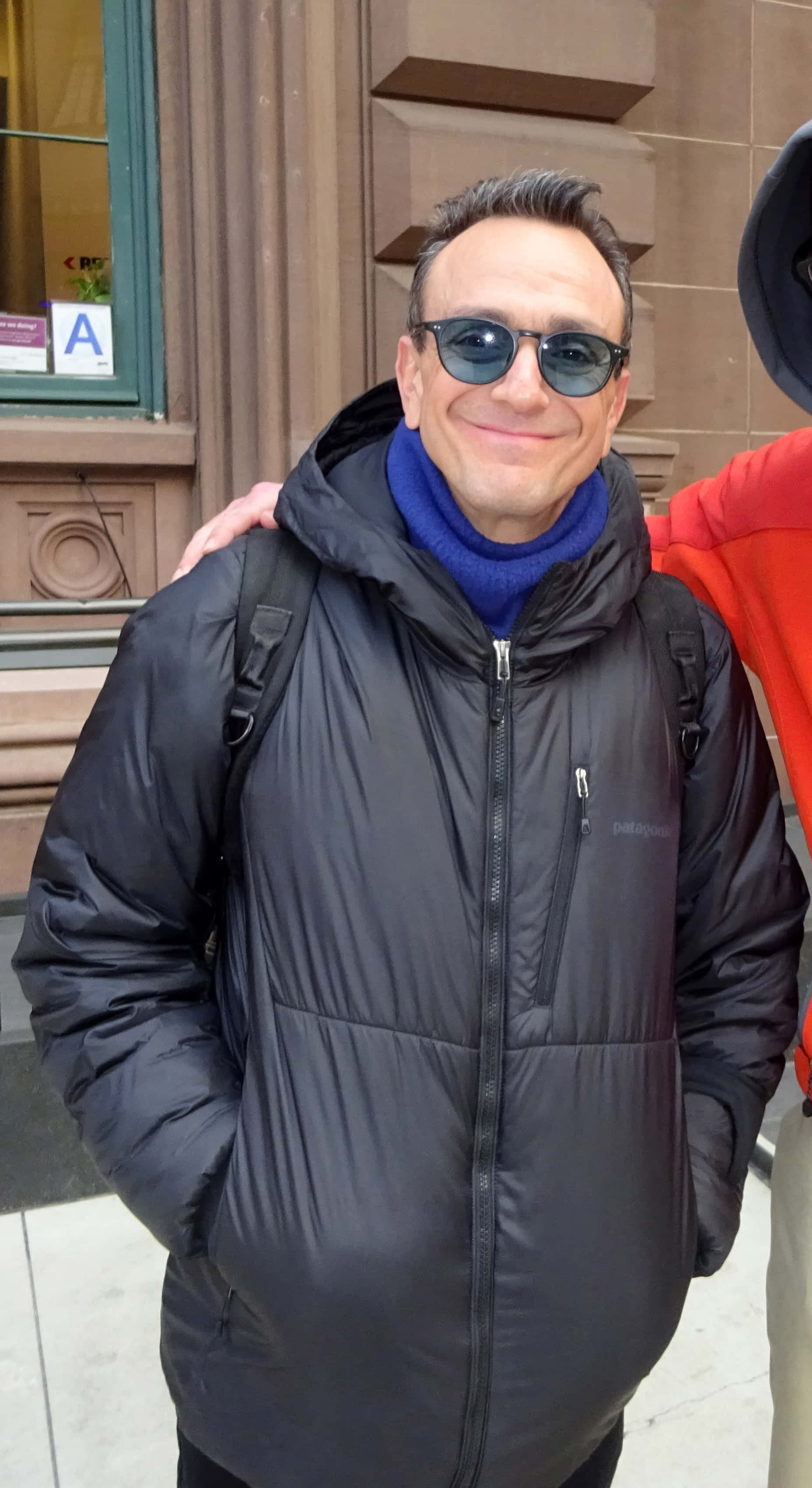 Hank Azaria, black puffer jacket, blue turtleneck, 2K Phone Wallpaper