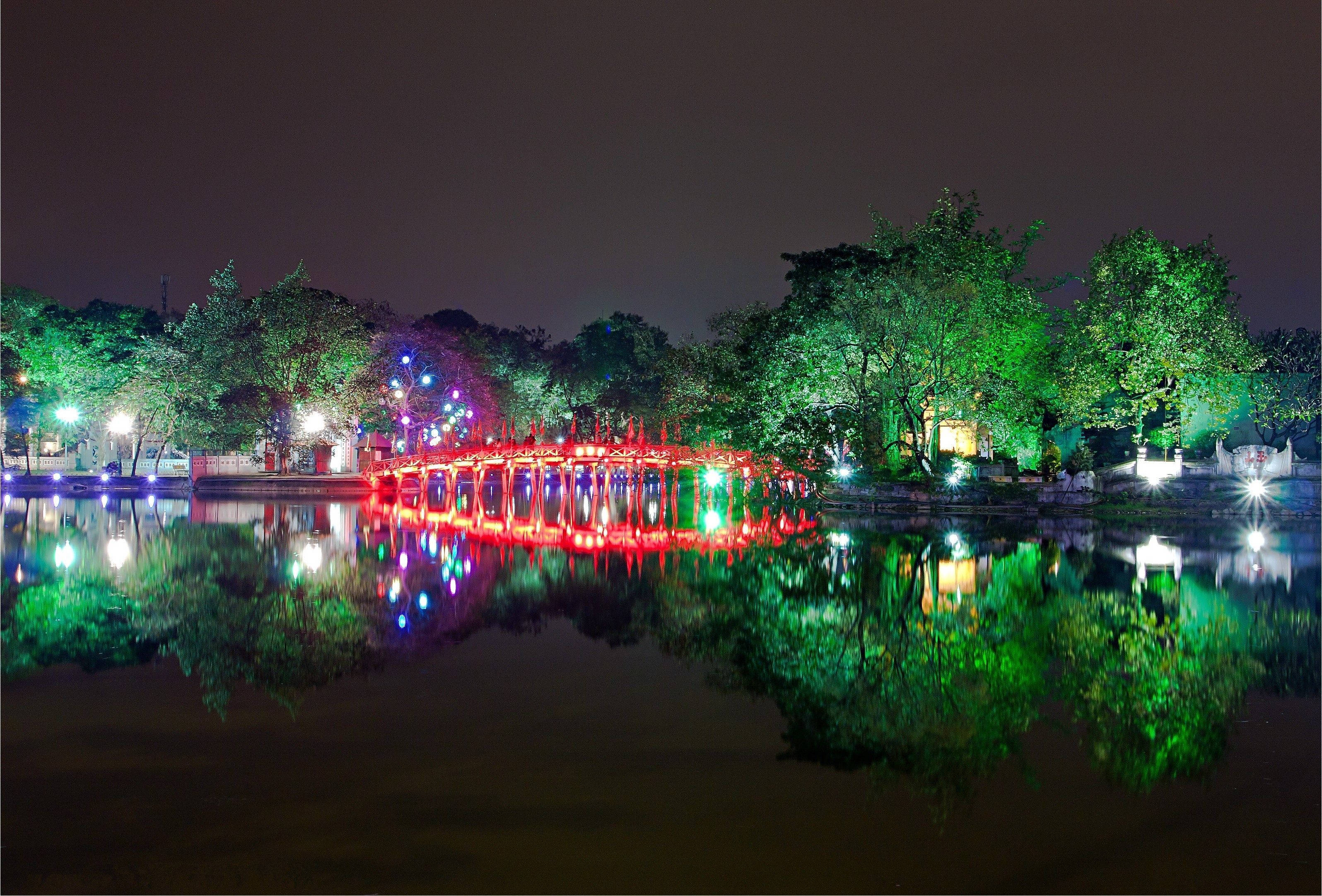 luminous garden tree, Hanoi, glowing red arched bridge, 2K Desktop Wallpaper