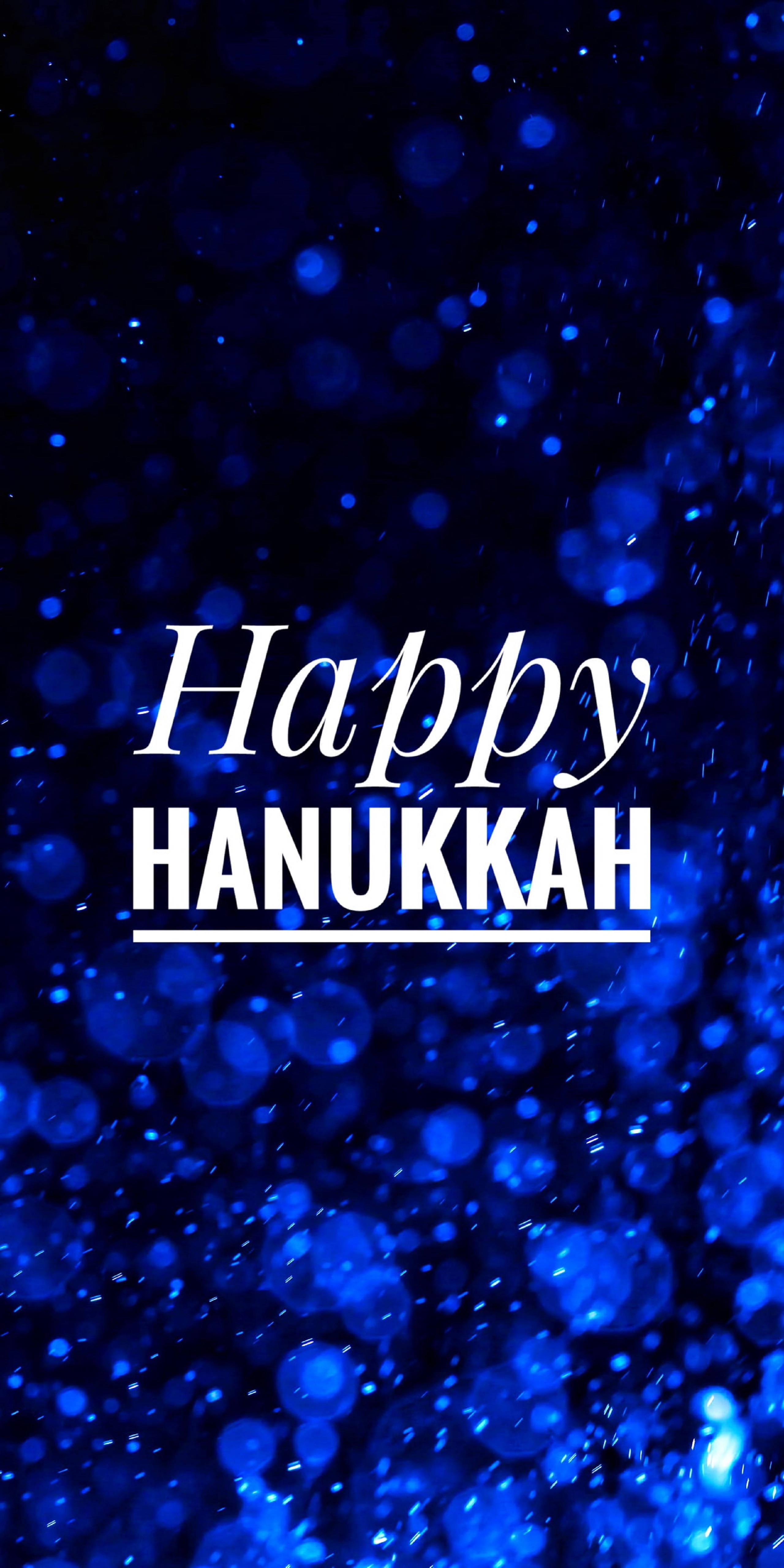 Happy Hanukkah, blue glittery background, white cursive text, 5K Phone Wallpaper