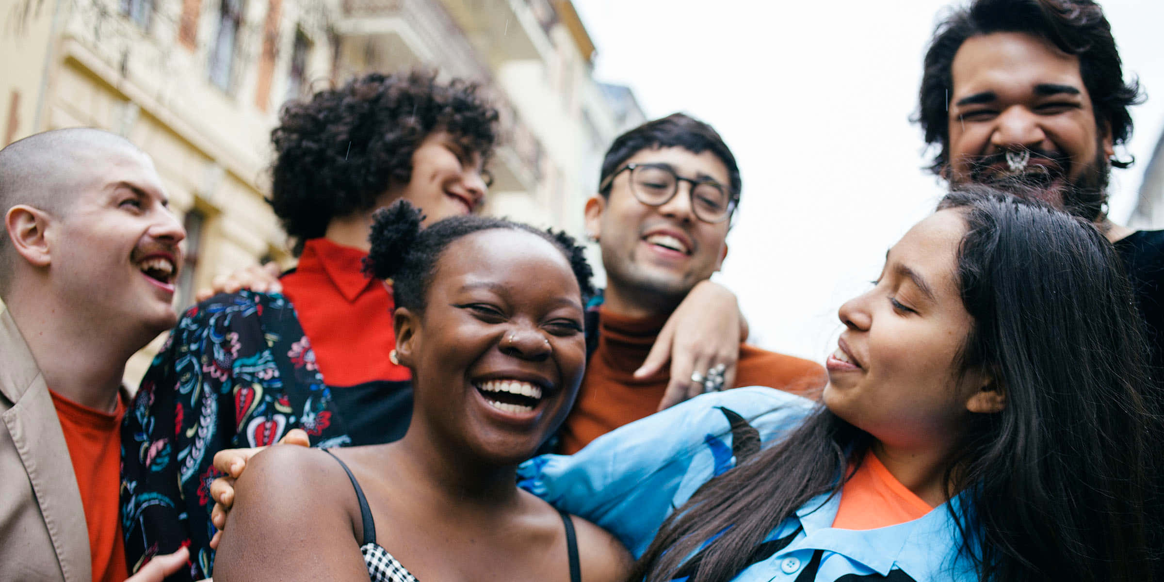 Happy Young Friends, sunlit urban alleyway, joyful diverse group of friends, Full HD Desktop Wallpaper