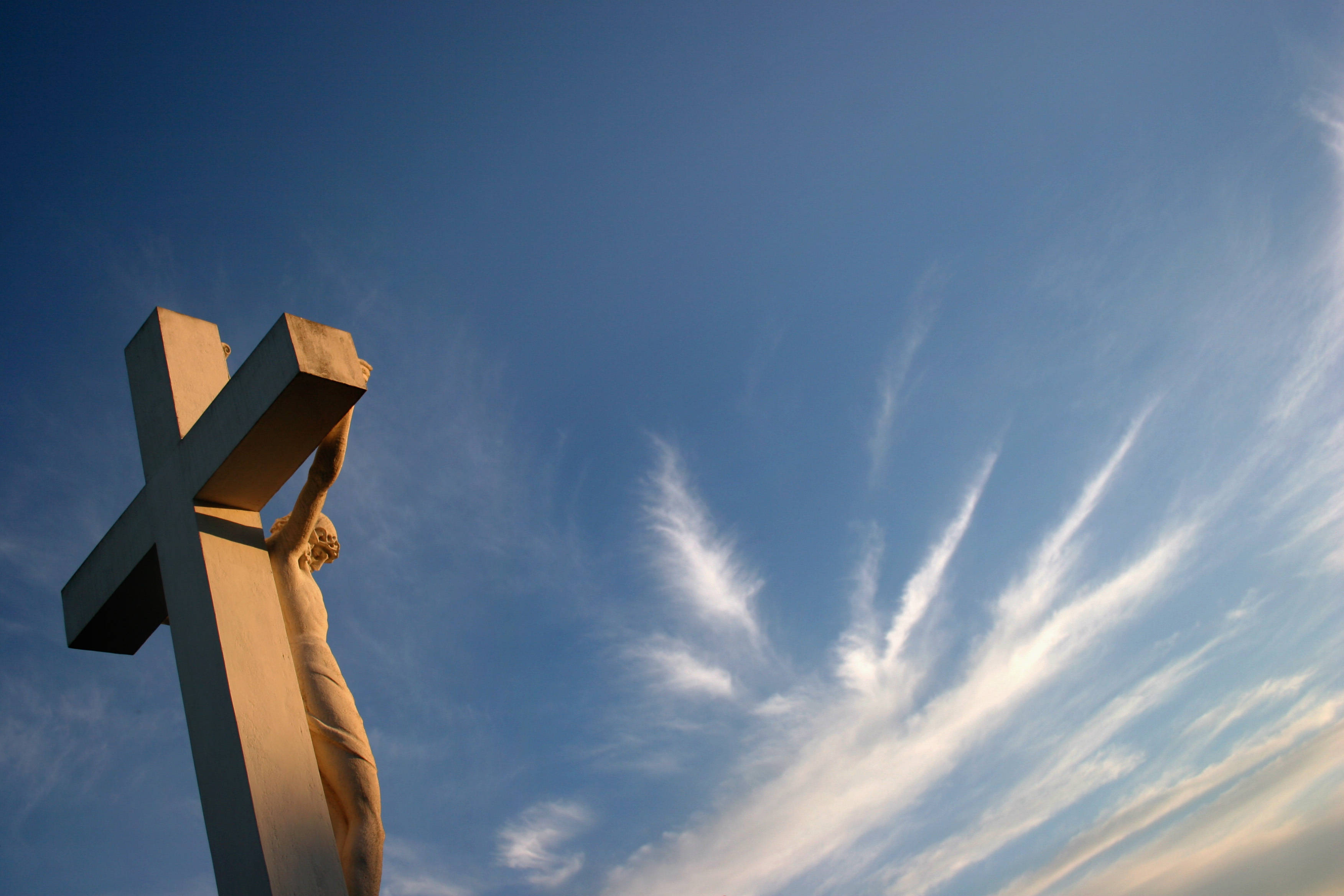 Good Friday Sky, stone crucifix statue, vast blue sky, 2K Desktop Wallpaper