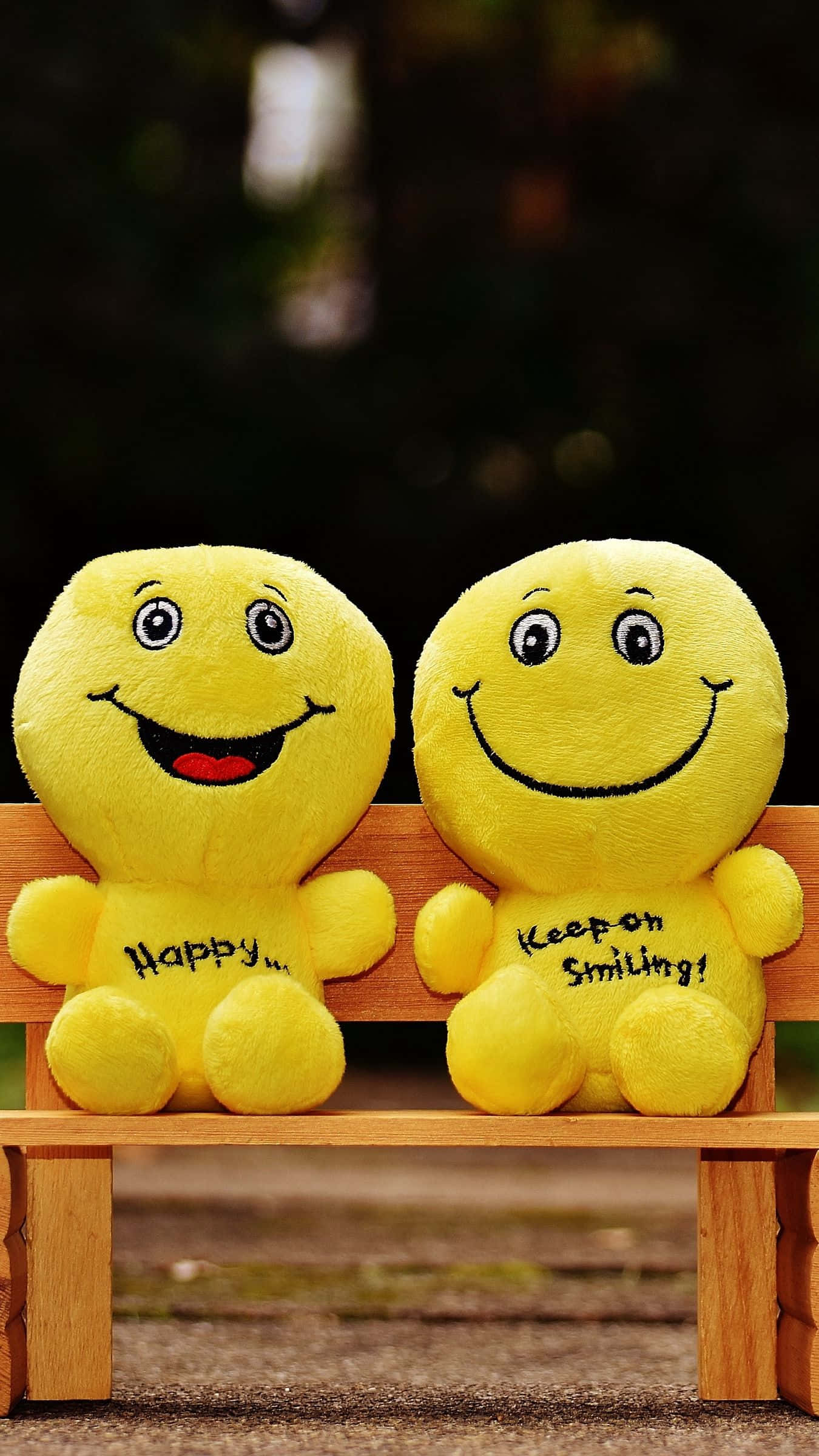 Happy iPhone, yellow smiley face plush toys, wooden bench, Full HD Phone Wallpaper