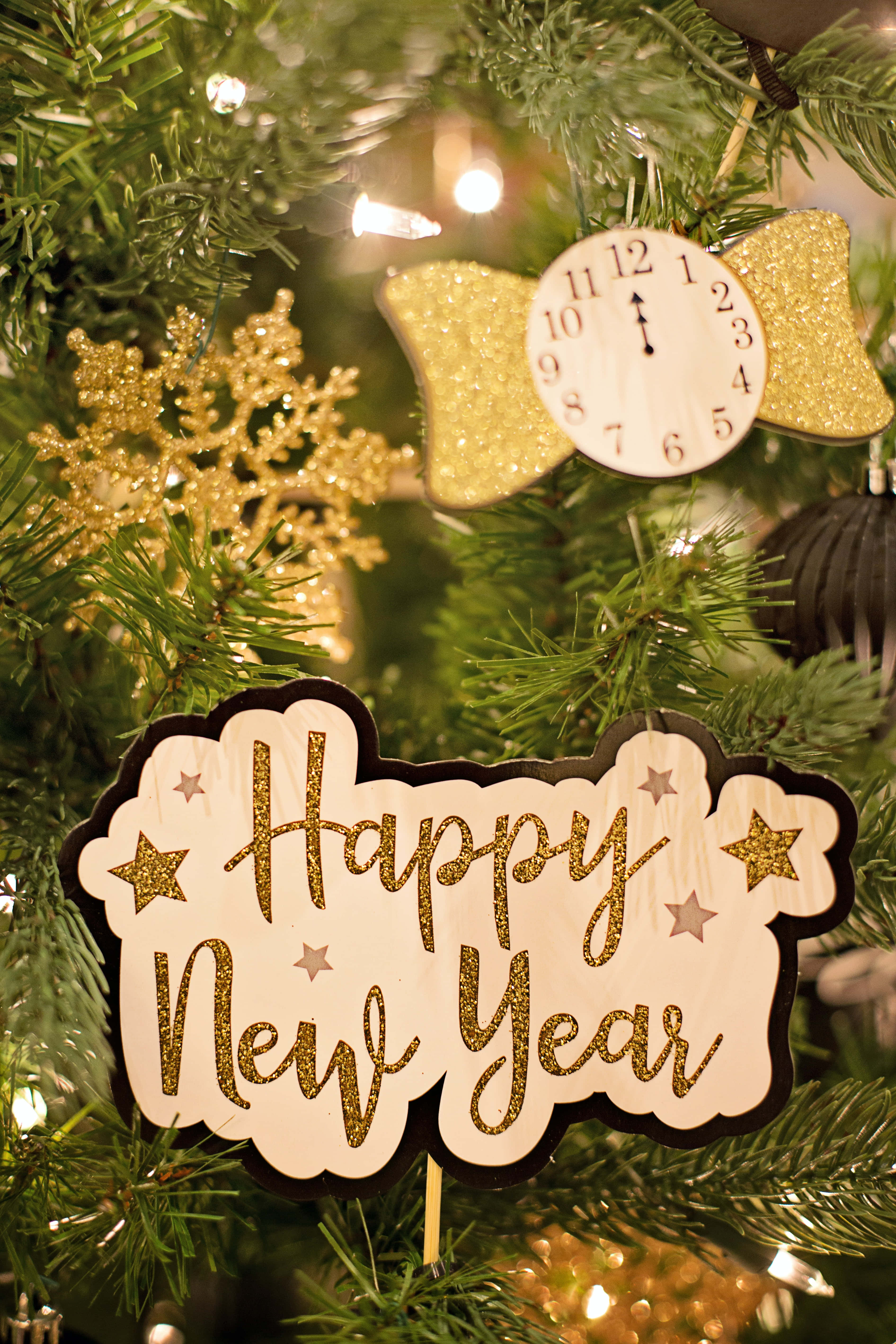 Happy New Year Phone, Christmas tree, glittering 'Happy New Year' sign, 5K Phone Wallpaper