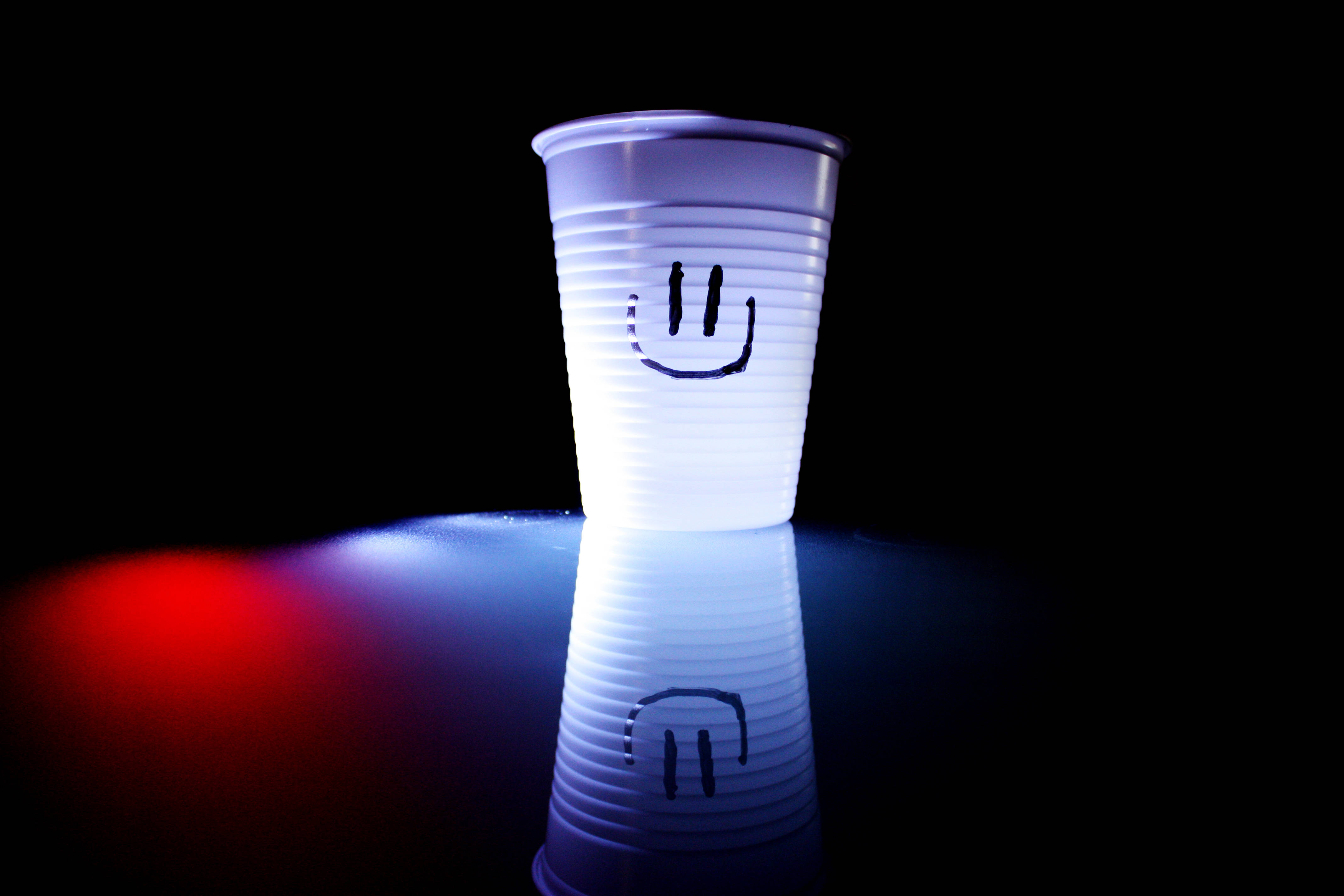 white plastic cup, hand-drawn smiley face, blue light, 4K Desktop Wallpaper