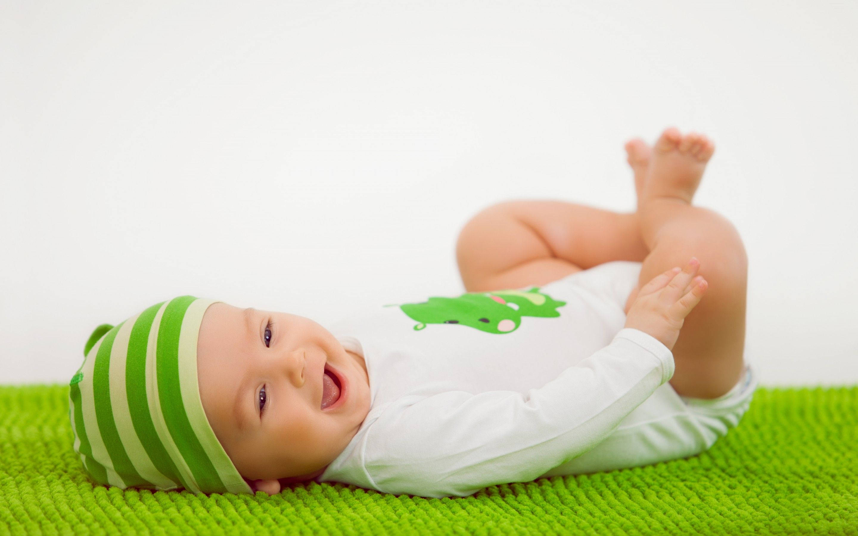 green striped hat, bright green textured blanket, white background, 2K Desktop Wallpaper
