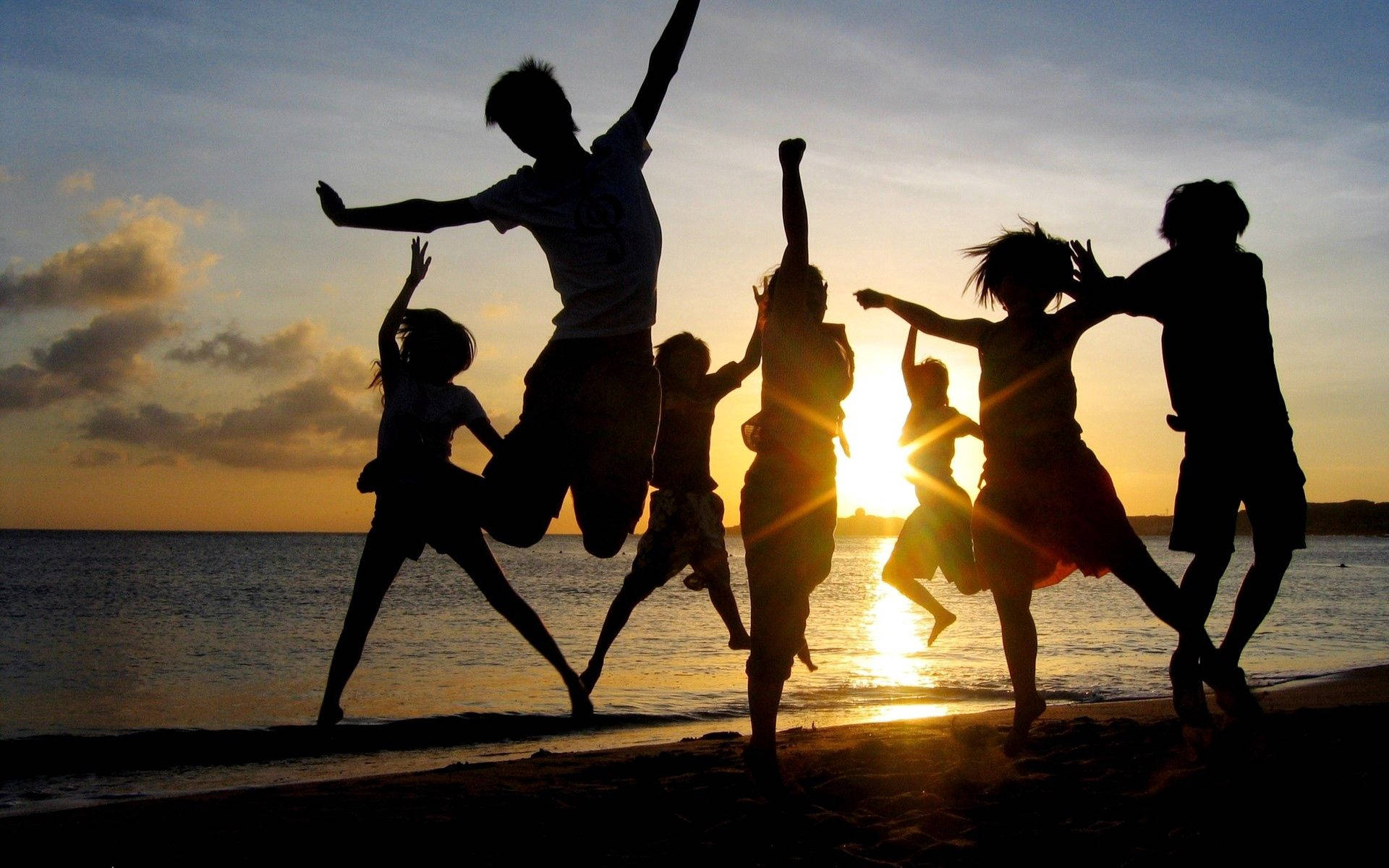 Happy Beach Goers Jump Shot, beach, sunet, Full HD Desktop Wallpaper