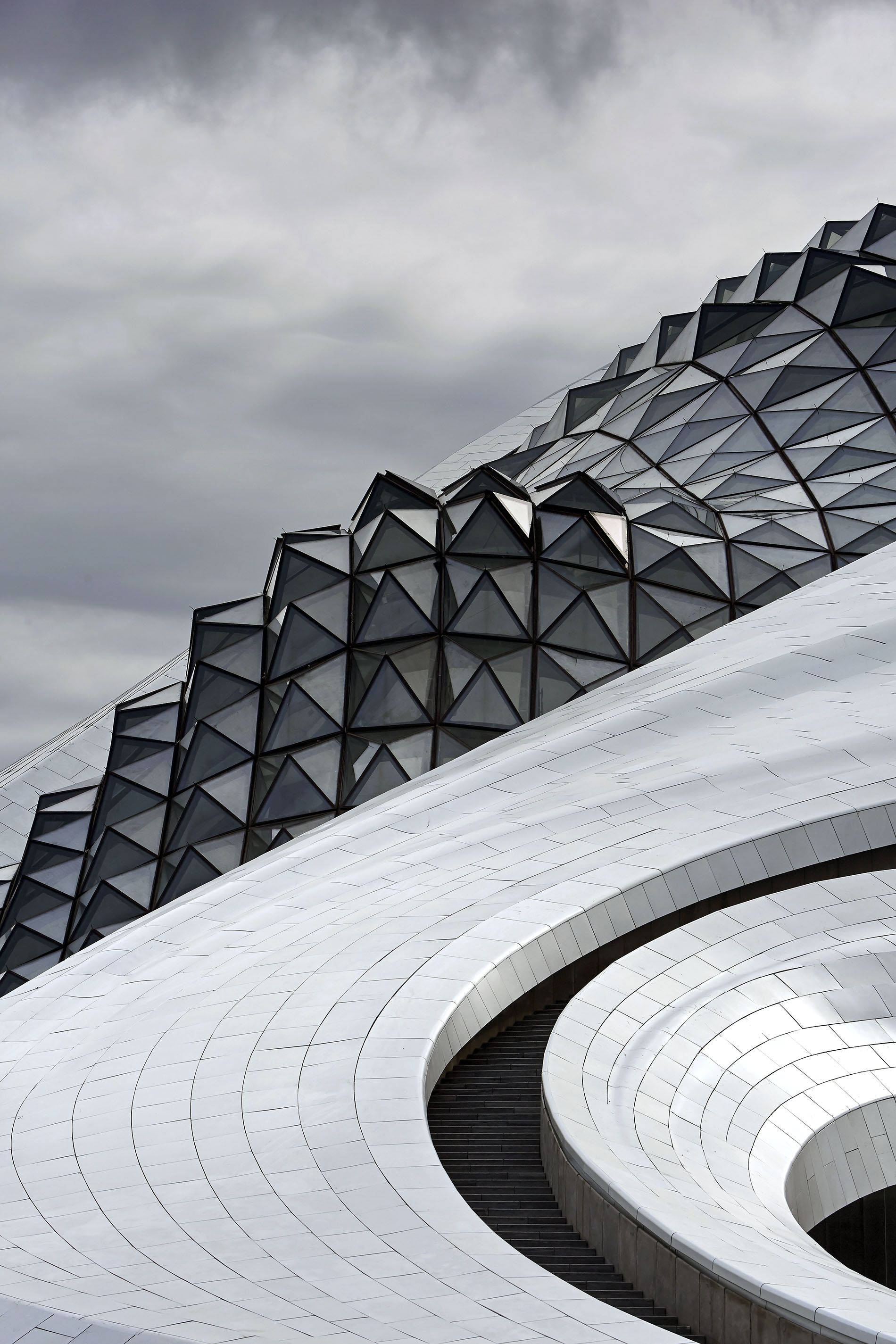 Harbin, geometric glass roof, curved white tiled staircase, 2K Phone Wallpaper