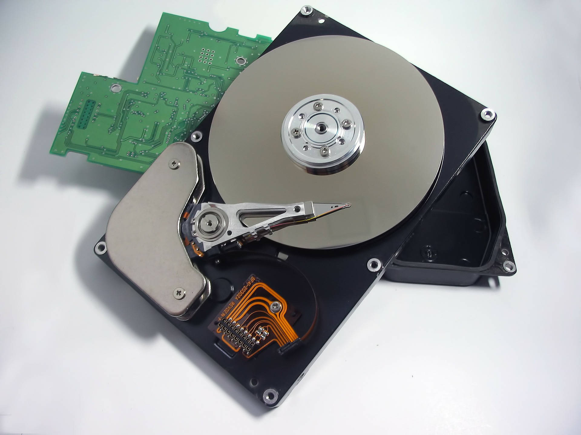 disassembled computer hard drive, top view, exposed platters, Full HD Desktop Wallpaper
