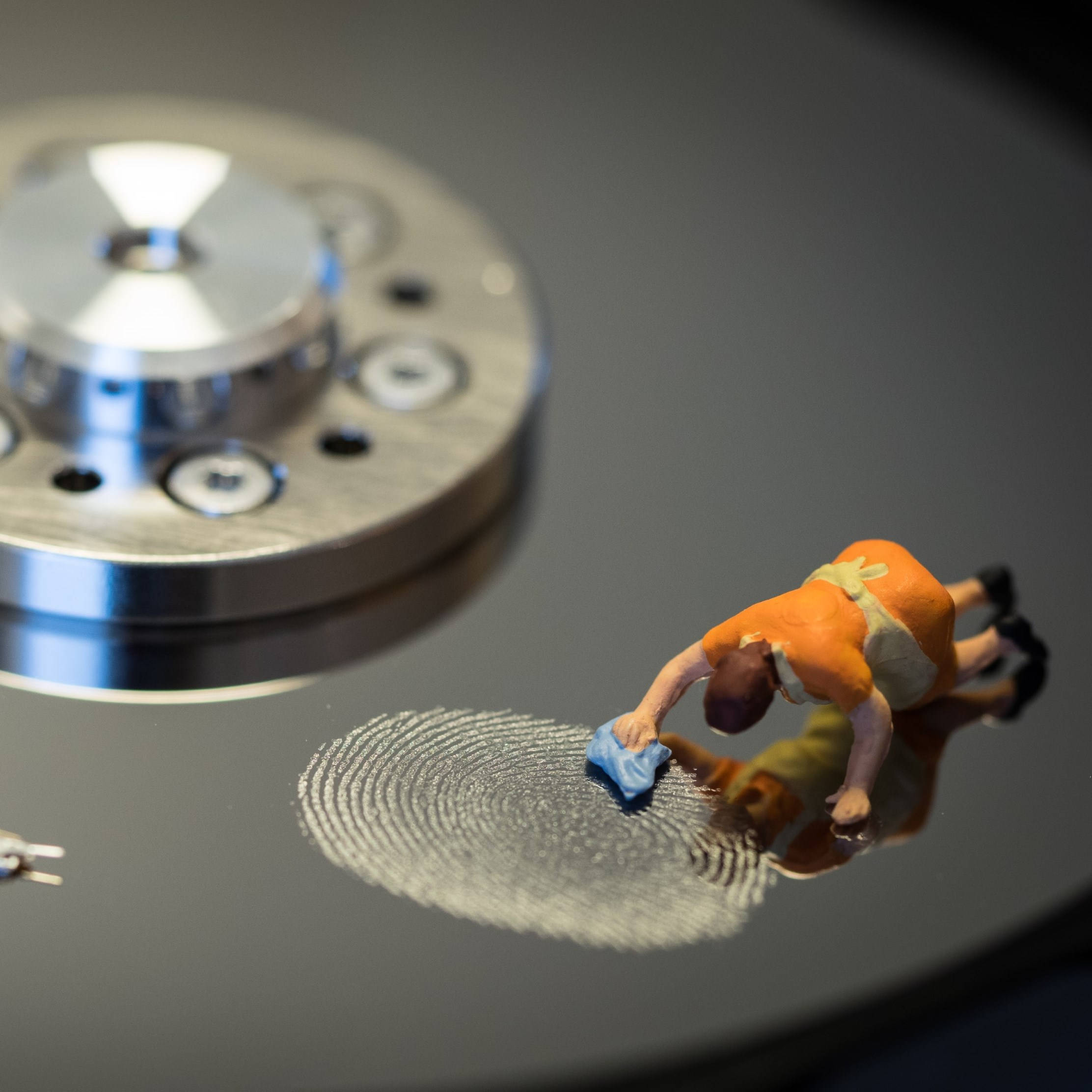 hard drive platter, orange jumpsuit, miniature maid toy, Full HD Desktop Wallpaper