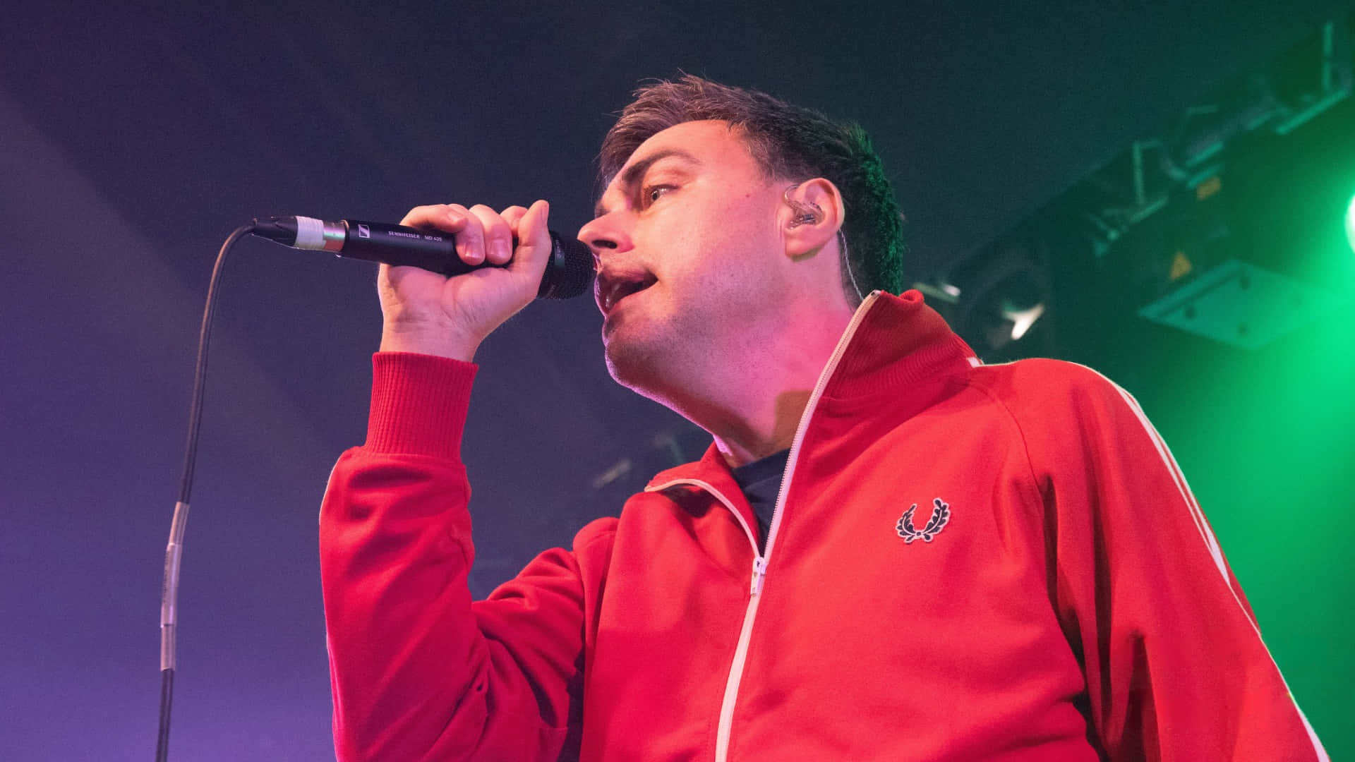 Hard Fi, red Fred Perry track jacket, vibrant green and purple stage lights, Full HD Desktop Wallpaper
