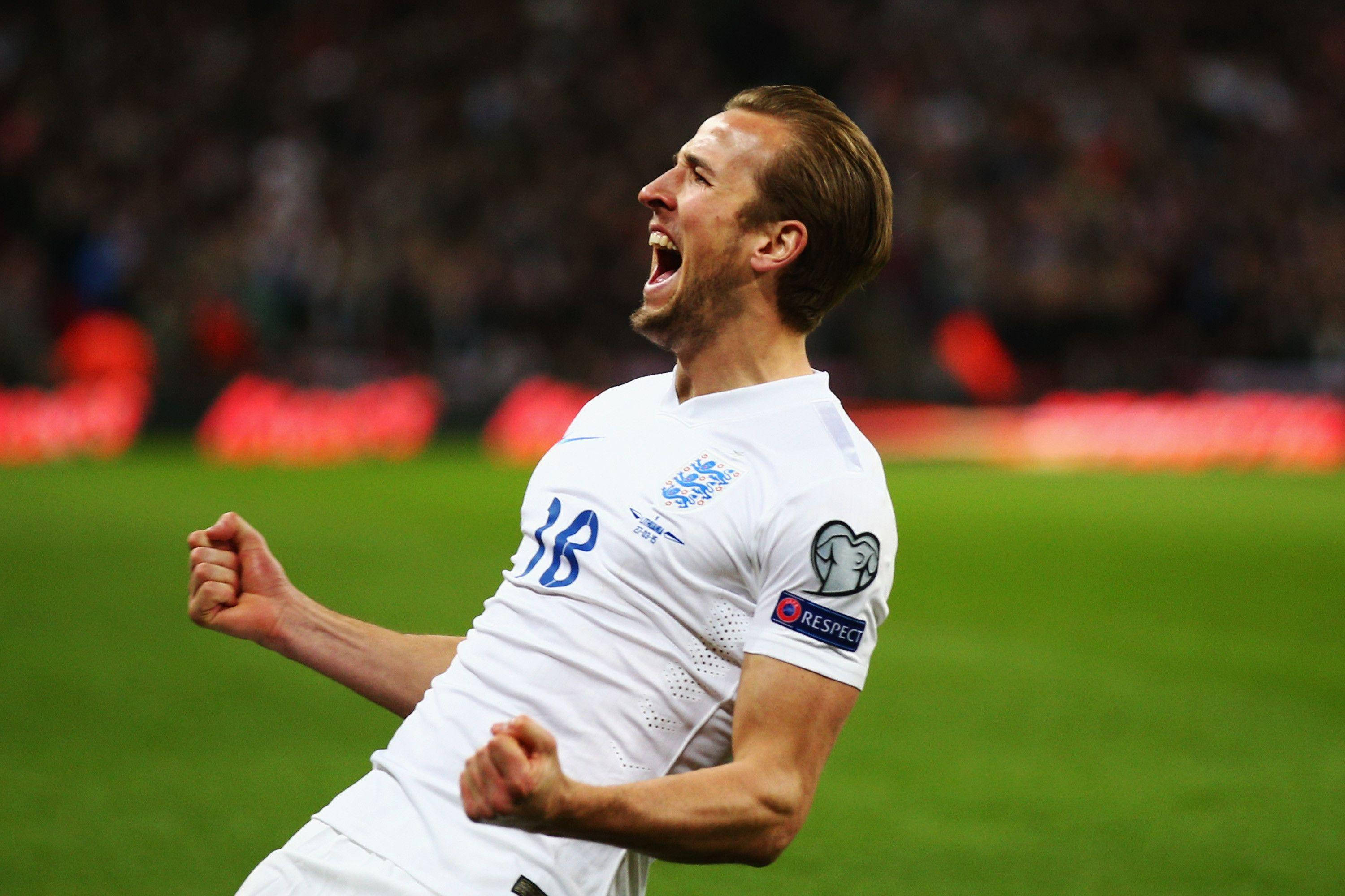 Harry Kane, white England jersey, vibrant green pitch, 2K Desktop Wallpaper
