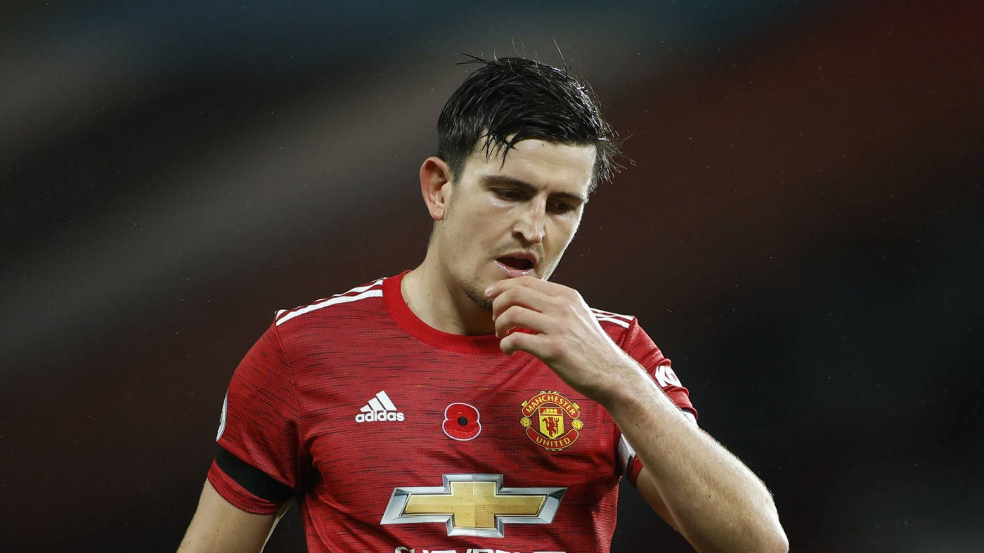 Harry Maguire, red Manchester United jersey, stadium lights, HD Desktop Wallpaper