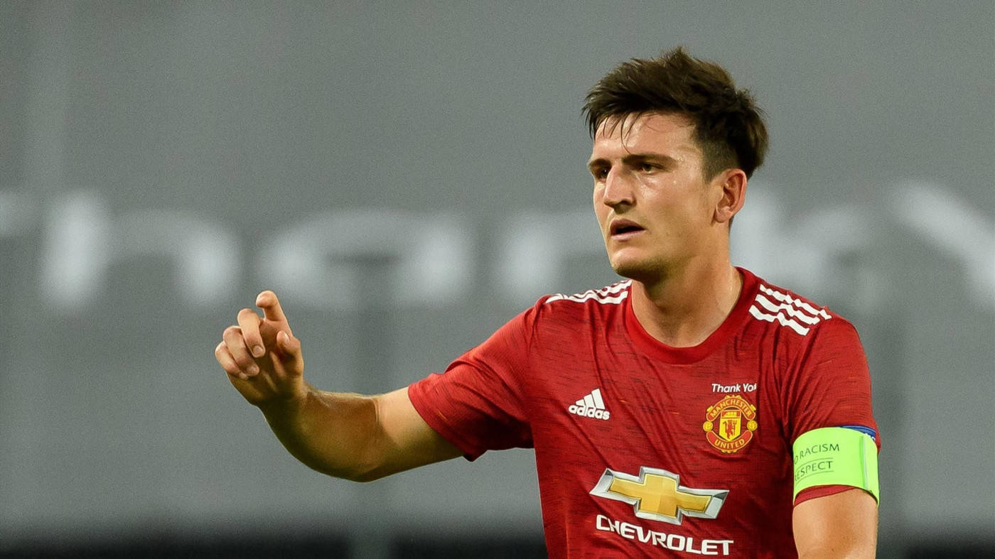 Harry Maguire, red Manchester United jersey, stadium lights, HD Desktop Wallpaper