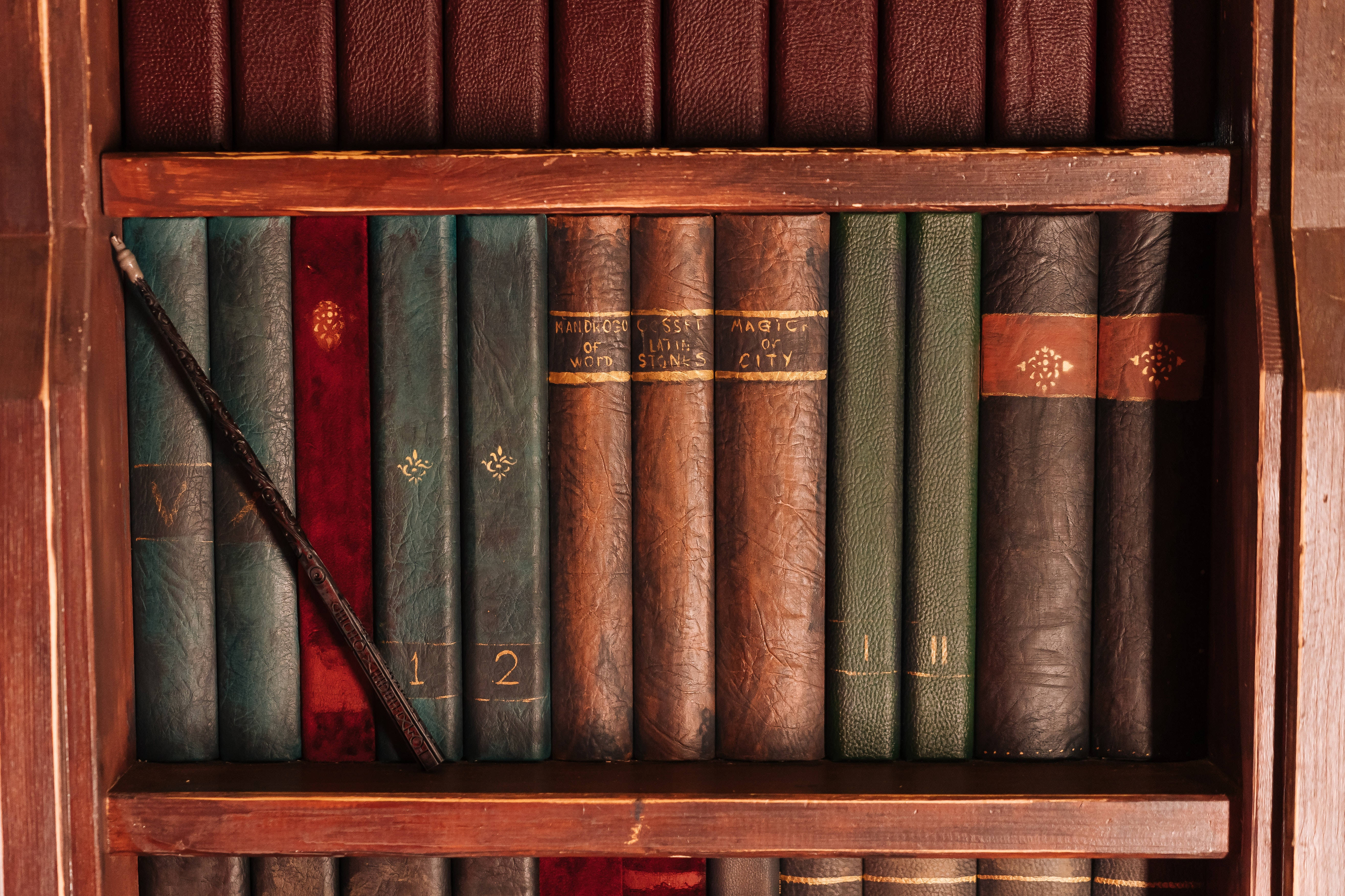 Harry Potter Aesthetic, wooden bookshelf, vintage leather-bound books, 5K Desktop Wallpaper