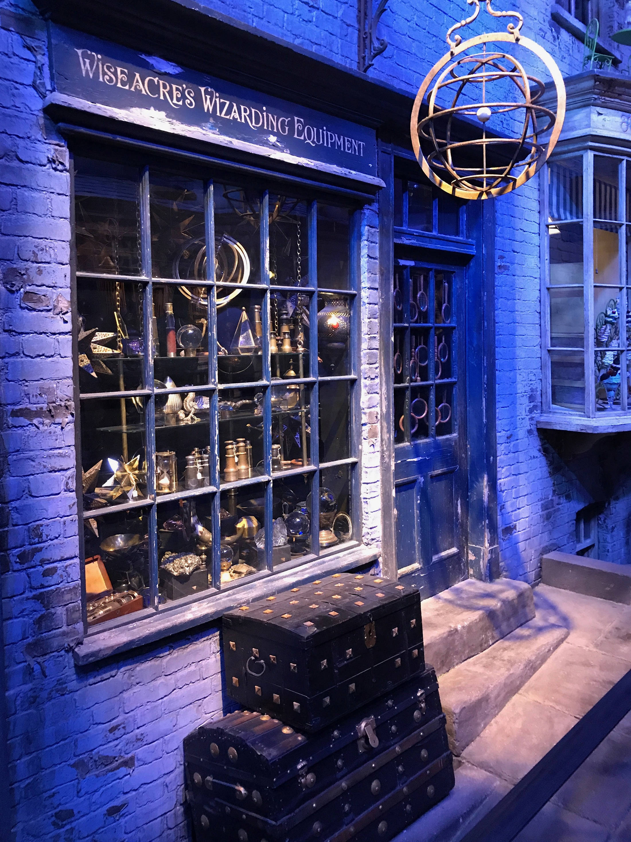 Harry Potter, magical shopfront, blue light, 2K Phone Wallpaper