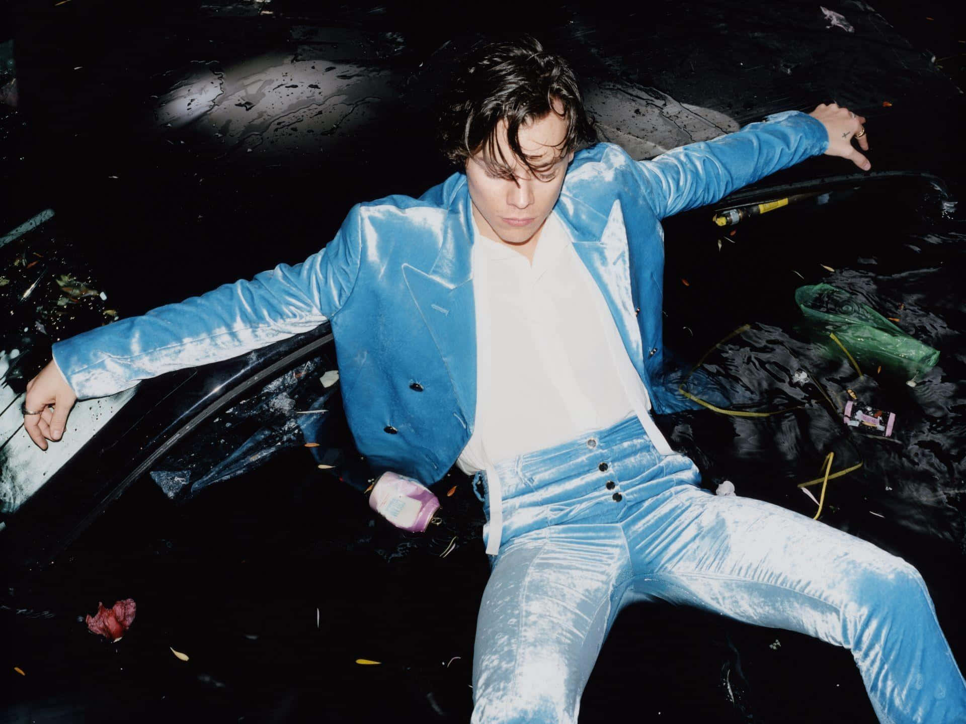 Harry Styles, shimmering blue velvet suit, dark debris-strewn surface, Full HD Desktop Wallpaper