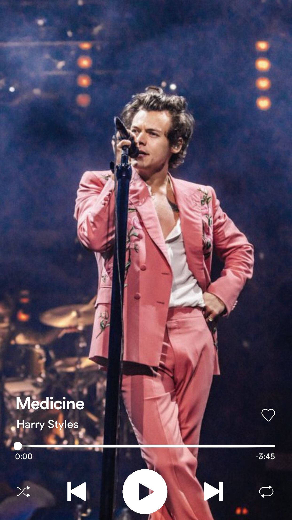 Harry Styles, vibrant pink suit, dramatic stage lights, Full HD Phone Wallpaper