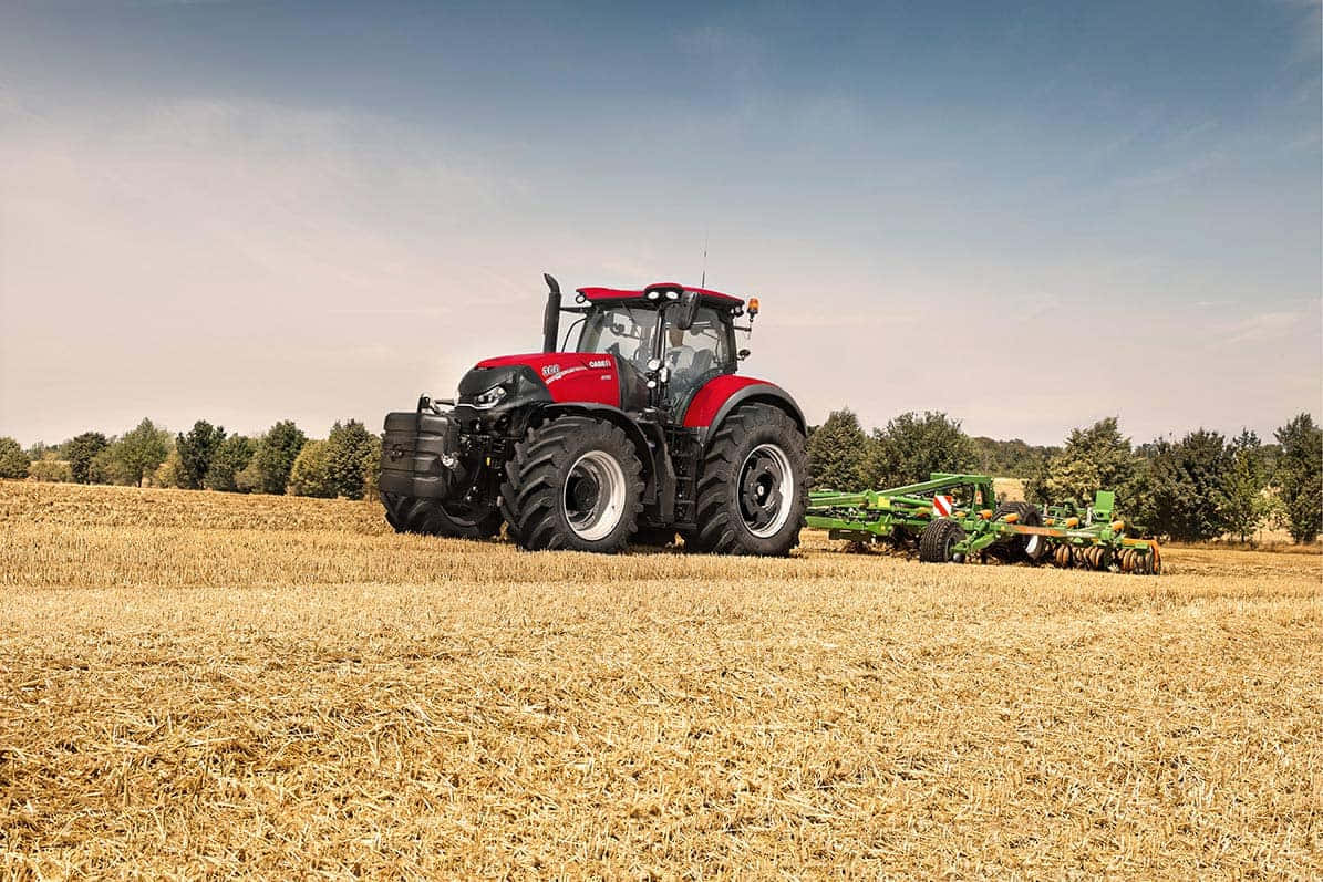 red tractor, green plow, golden harvested field, SD Desktop Wallpaper