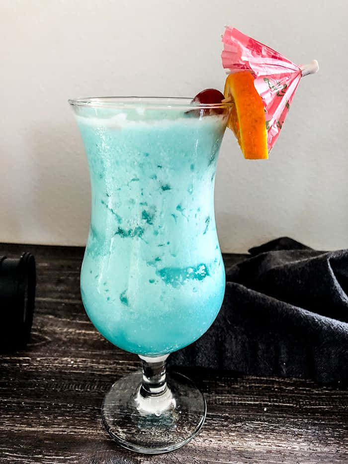 blue hawaii, hurricane glass, orange slice, SD Phone Wallpaper