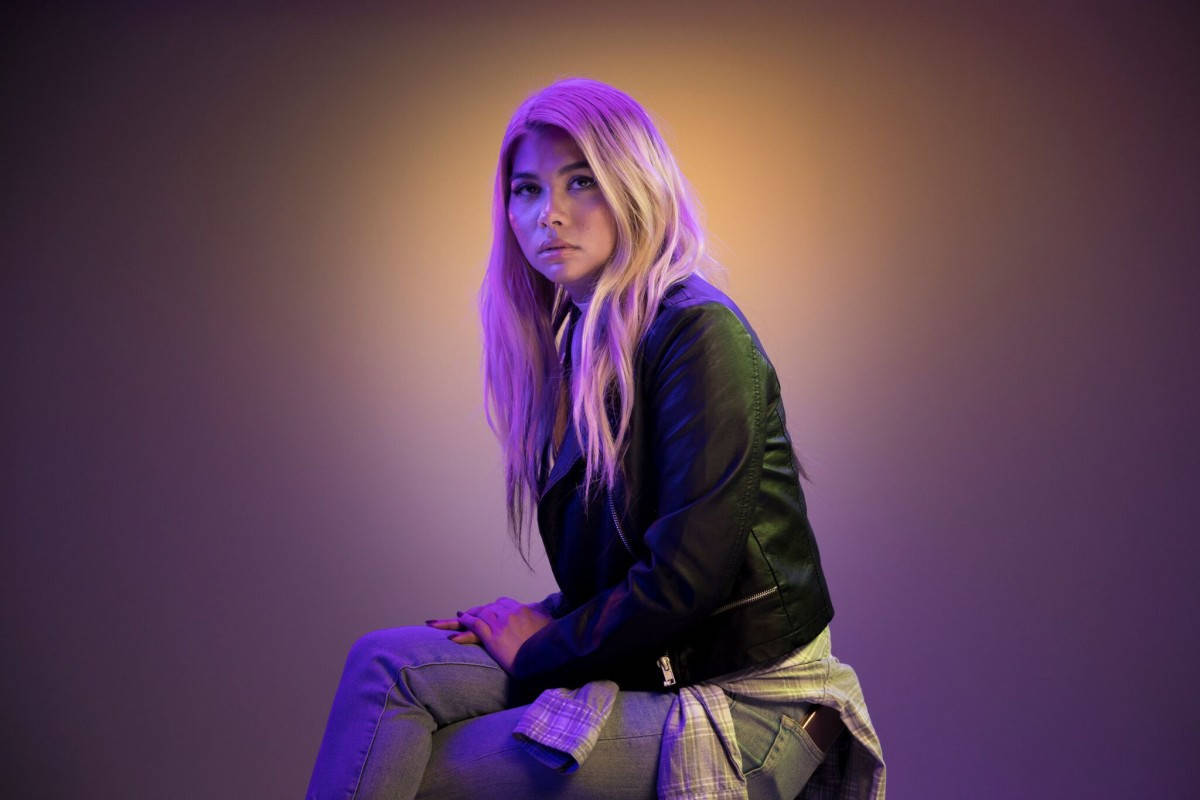 Hayley Kiyoko, black leather jacket, purple and orange lighting, SD Desktop Wallpaper