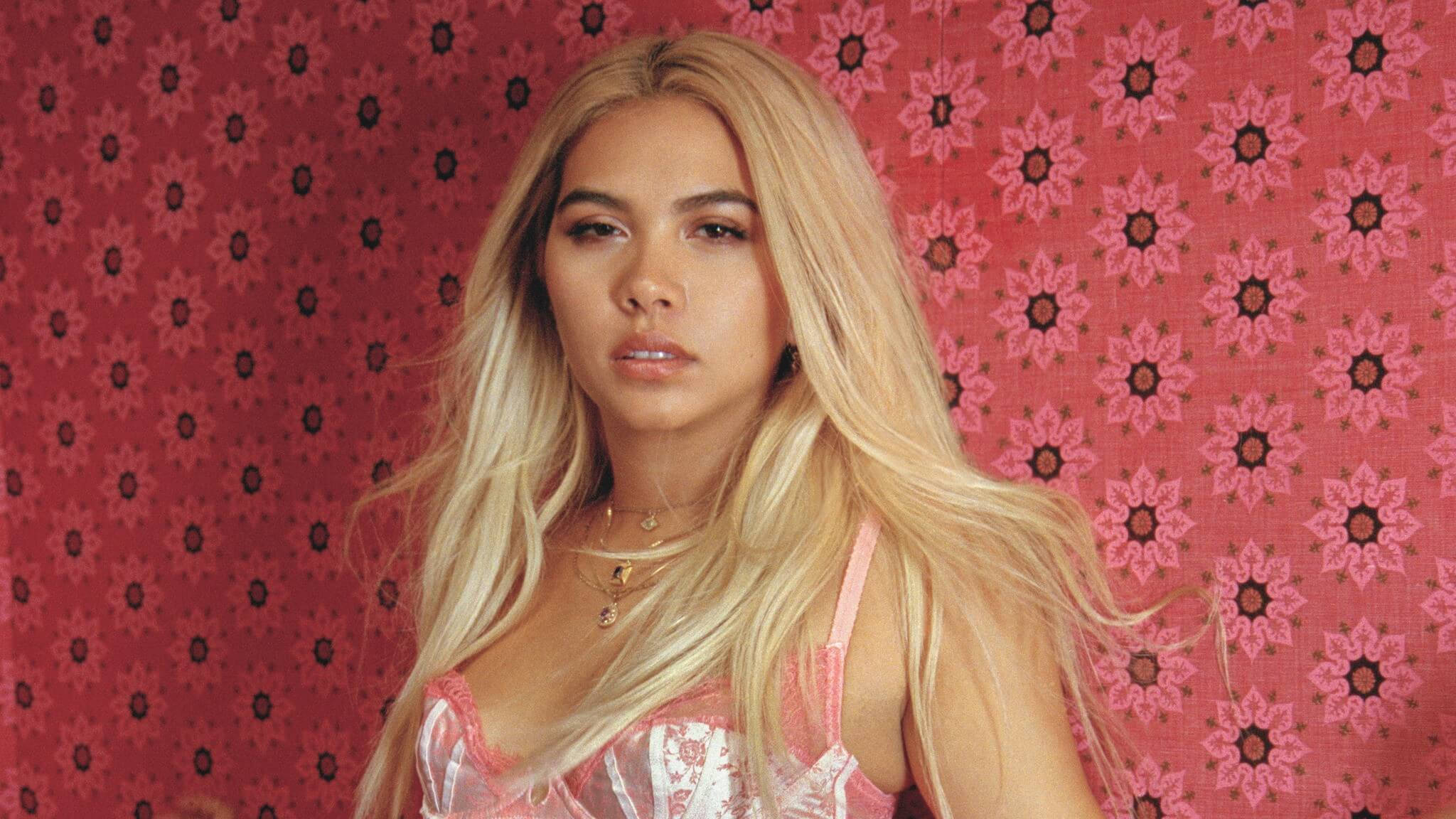 Hayley Kiyoko, long blonde hair, vibrant pink floral wallpaper, Full HD Desktop Wallpaper