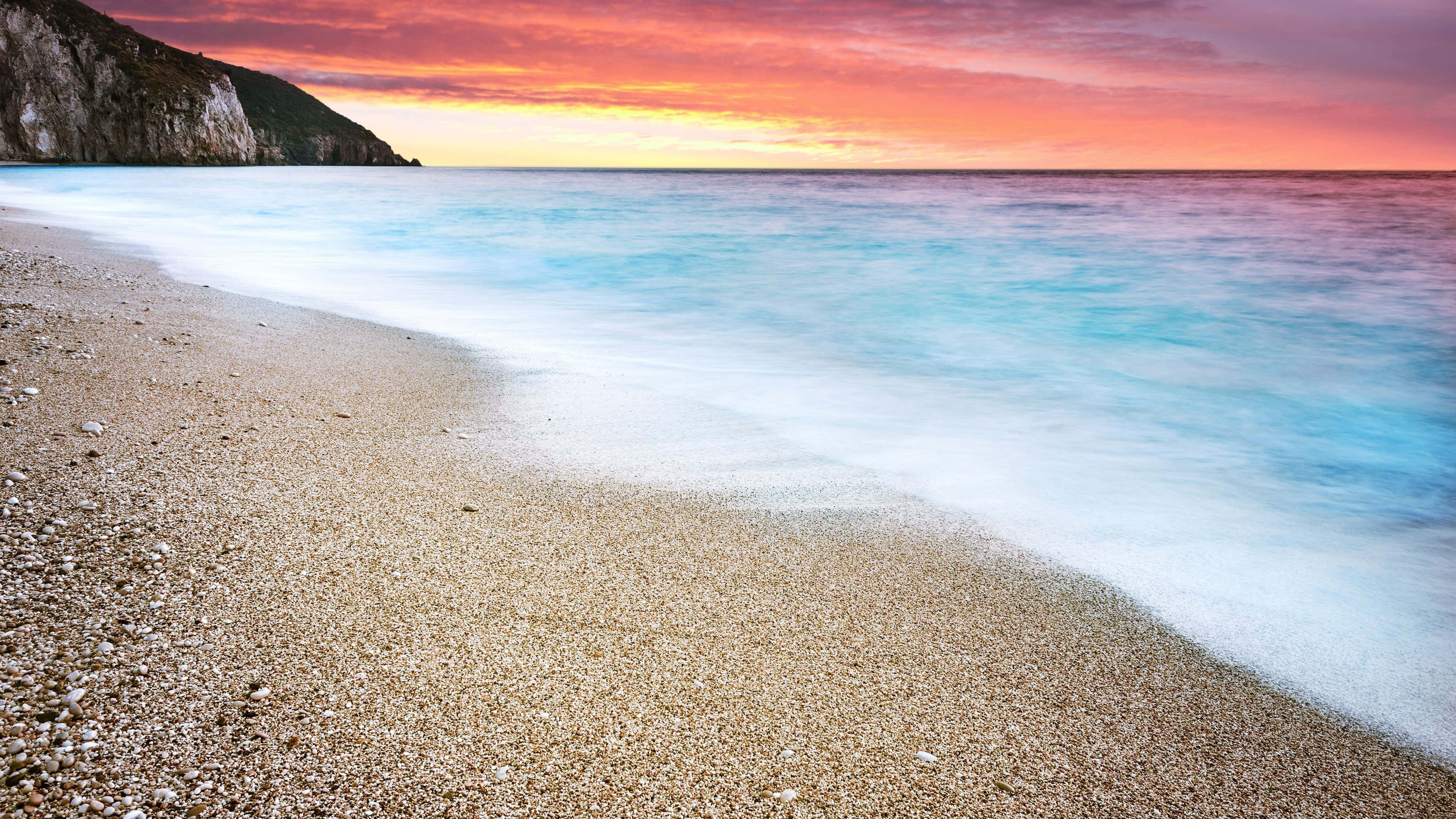 sunset, turquoise waves, pebbled shore, 4K Desktop Wallpaper