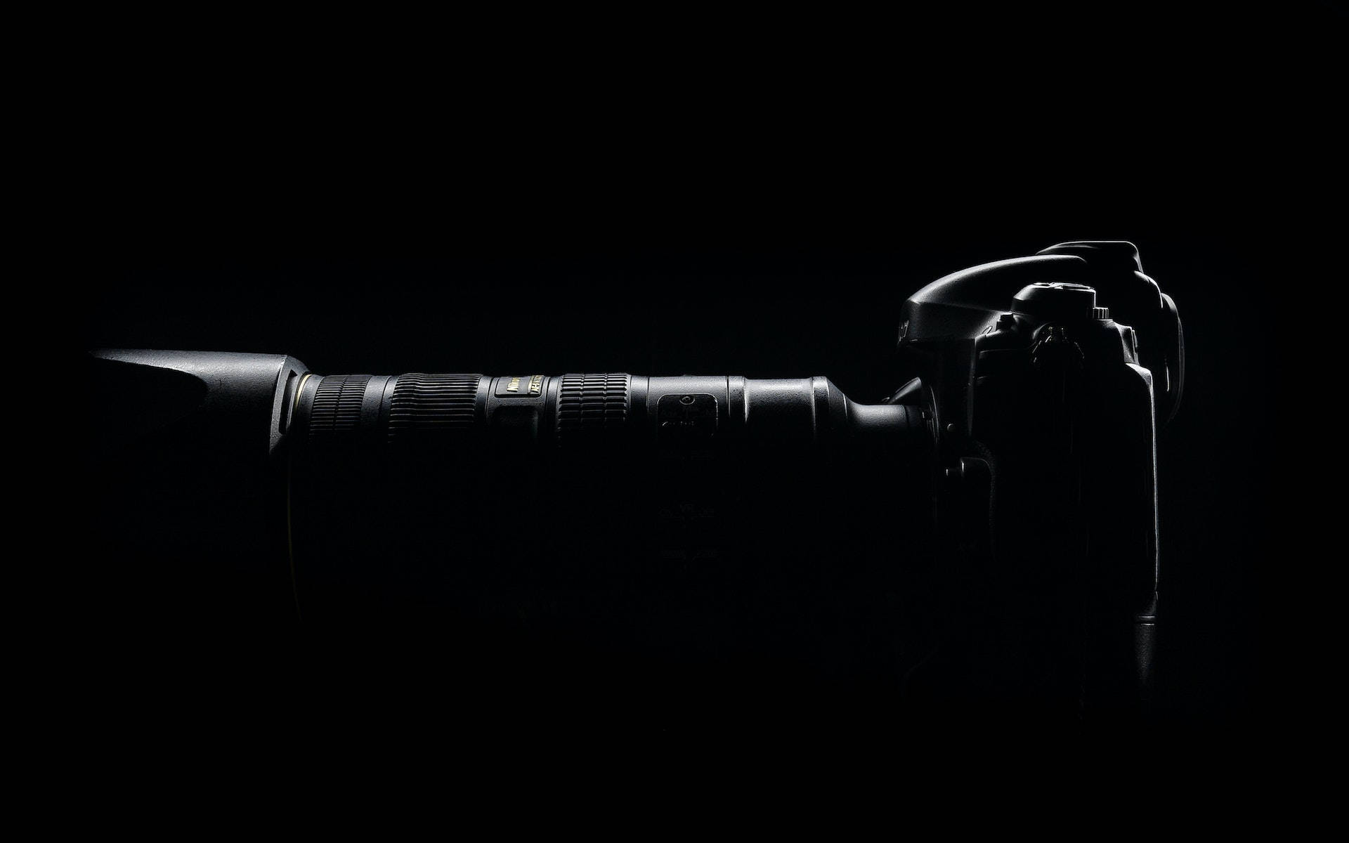 DSLR camera, telephoto lens, pure black background, Full HD Desktop Wallpaper