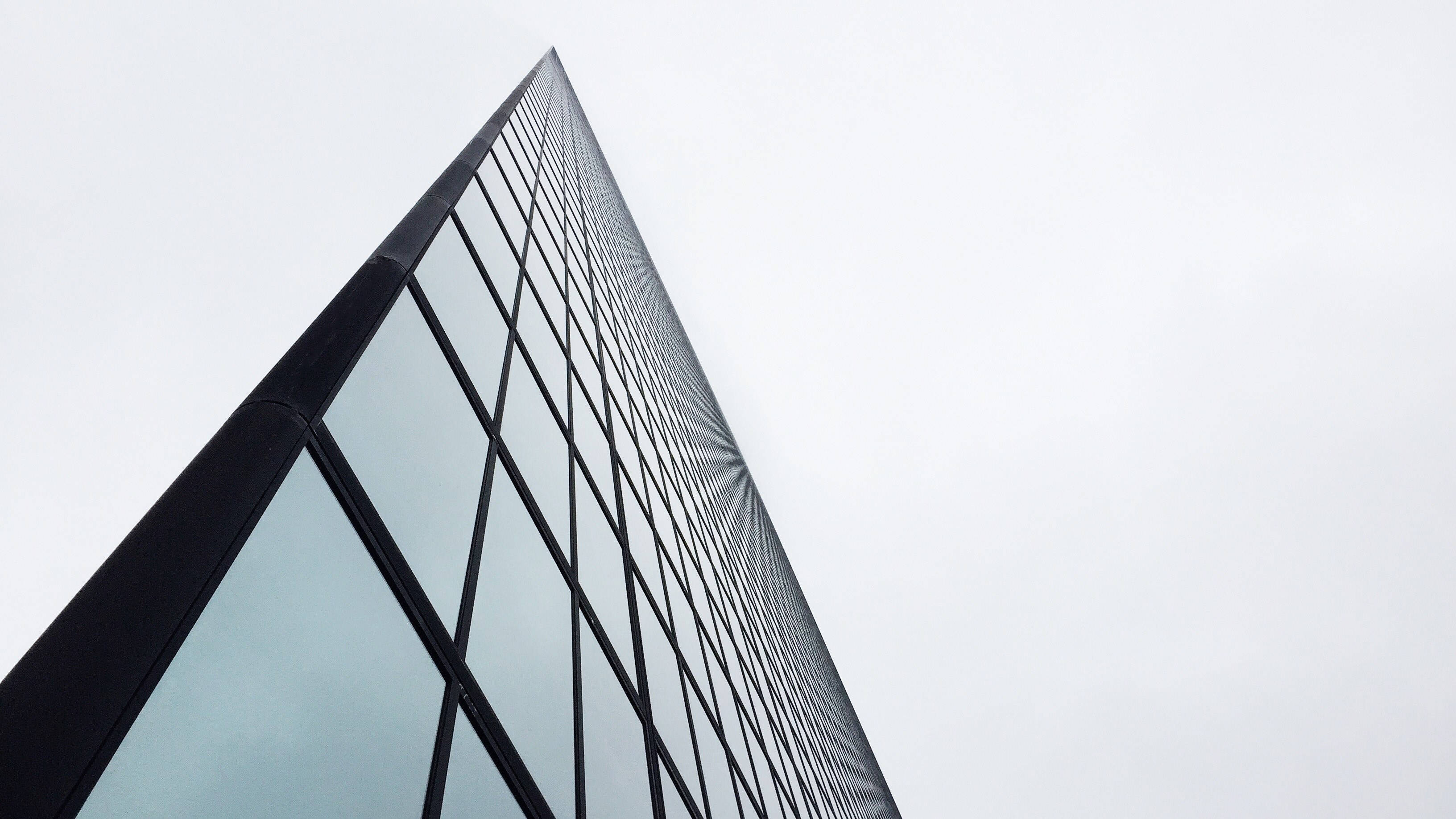 HD Engineering, glass skyscraper, geometric facade, 2K Desktop Wallpaper