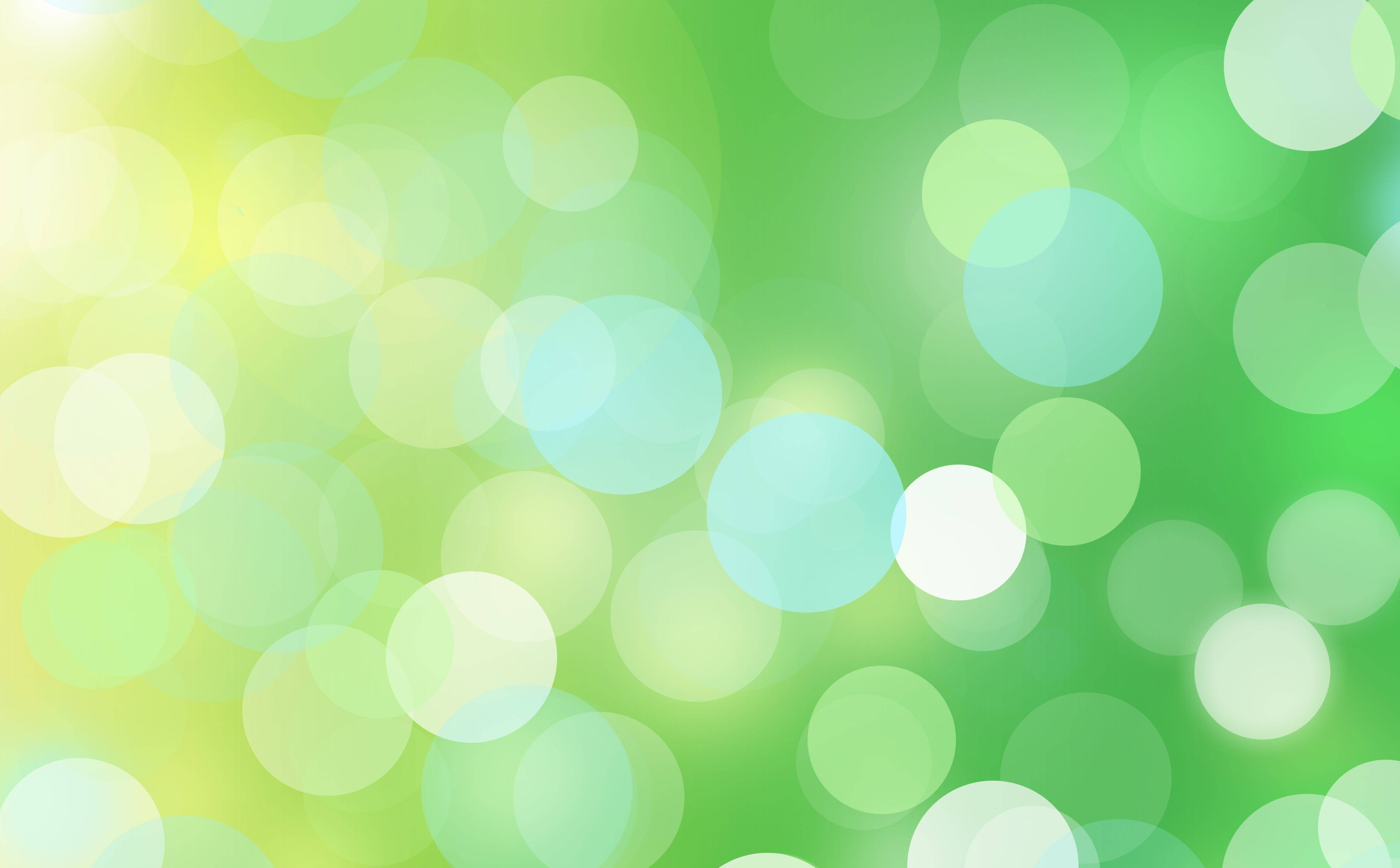 green bokeh, glowing circular bokeh lights, soft gradient of green and yellow hues, 5K Desktop Wallpaper
