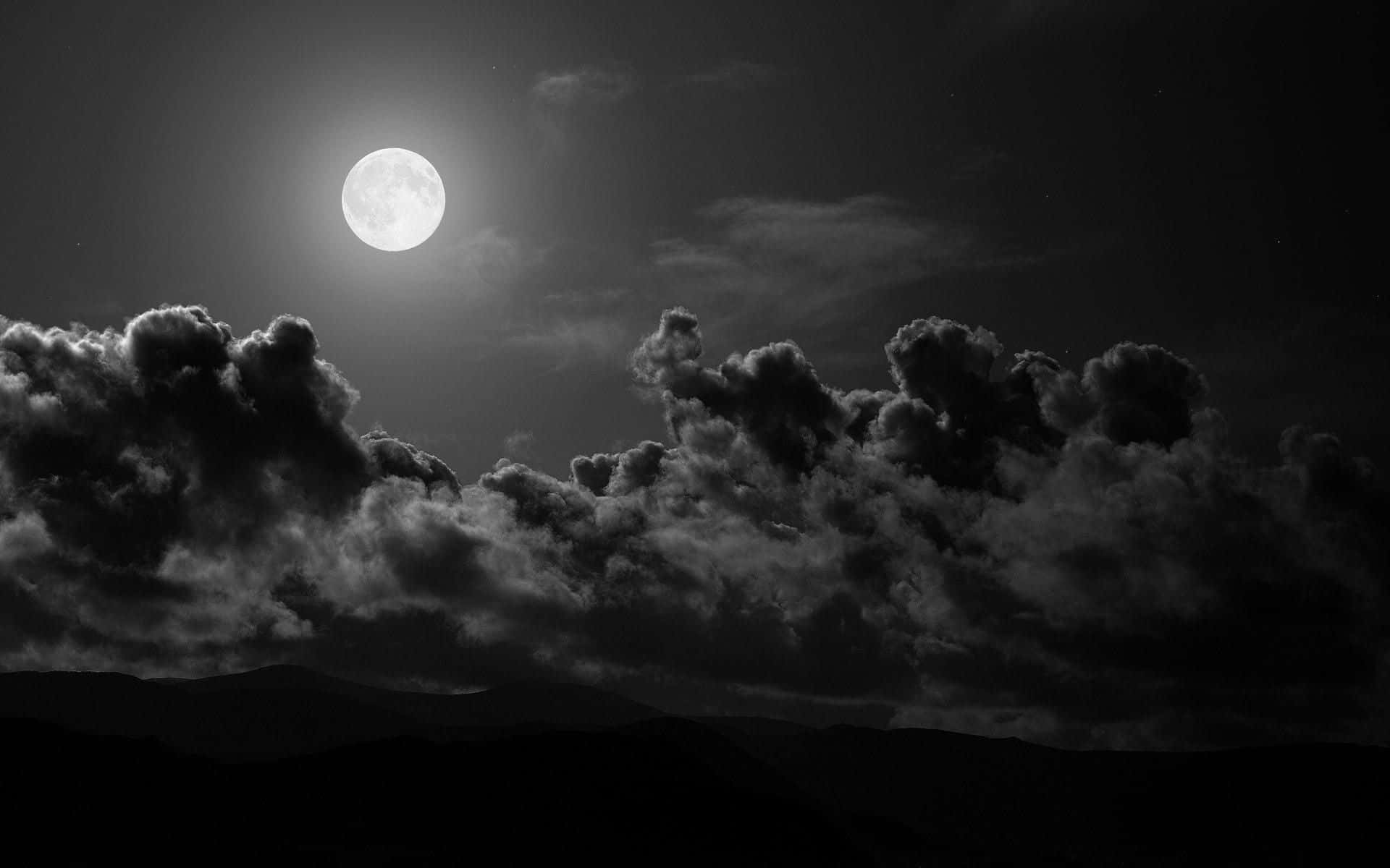 full moon, dramatic clouds, silhouetted mountains, Full HD Desktop Wallpaper