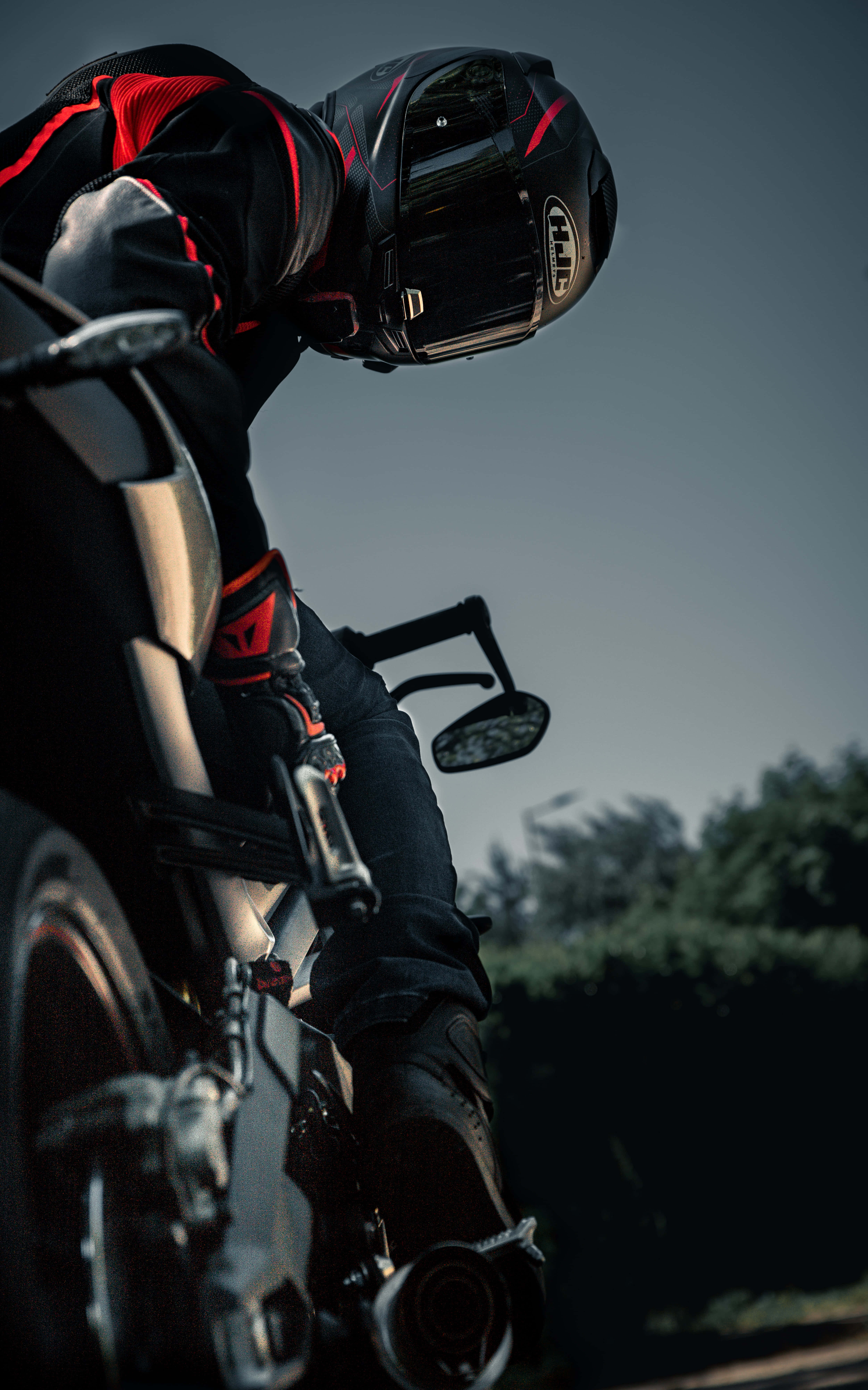 motorcyclist, black and red gear, sleek bike, 8K Phone Wallpaper