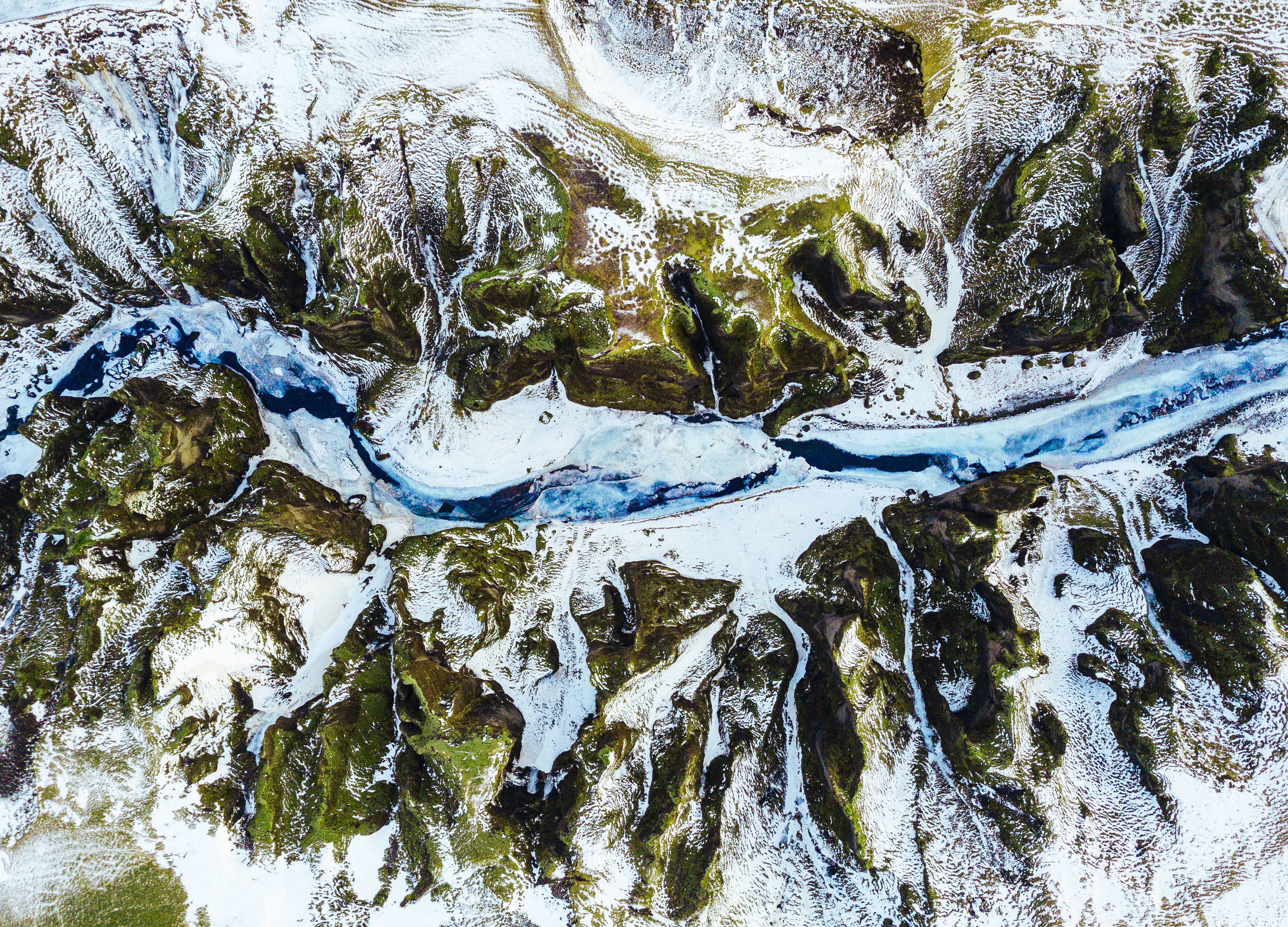 winding blue river, snow-dusted mossy mountains, aerial view, 4K Desktop Wallpaper