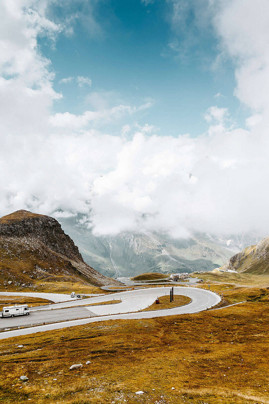 zigzagging HD mountain roads, winding mountain road, rugged peaks, HD Phone Wallpaper